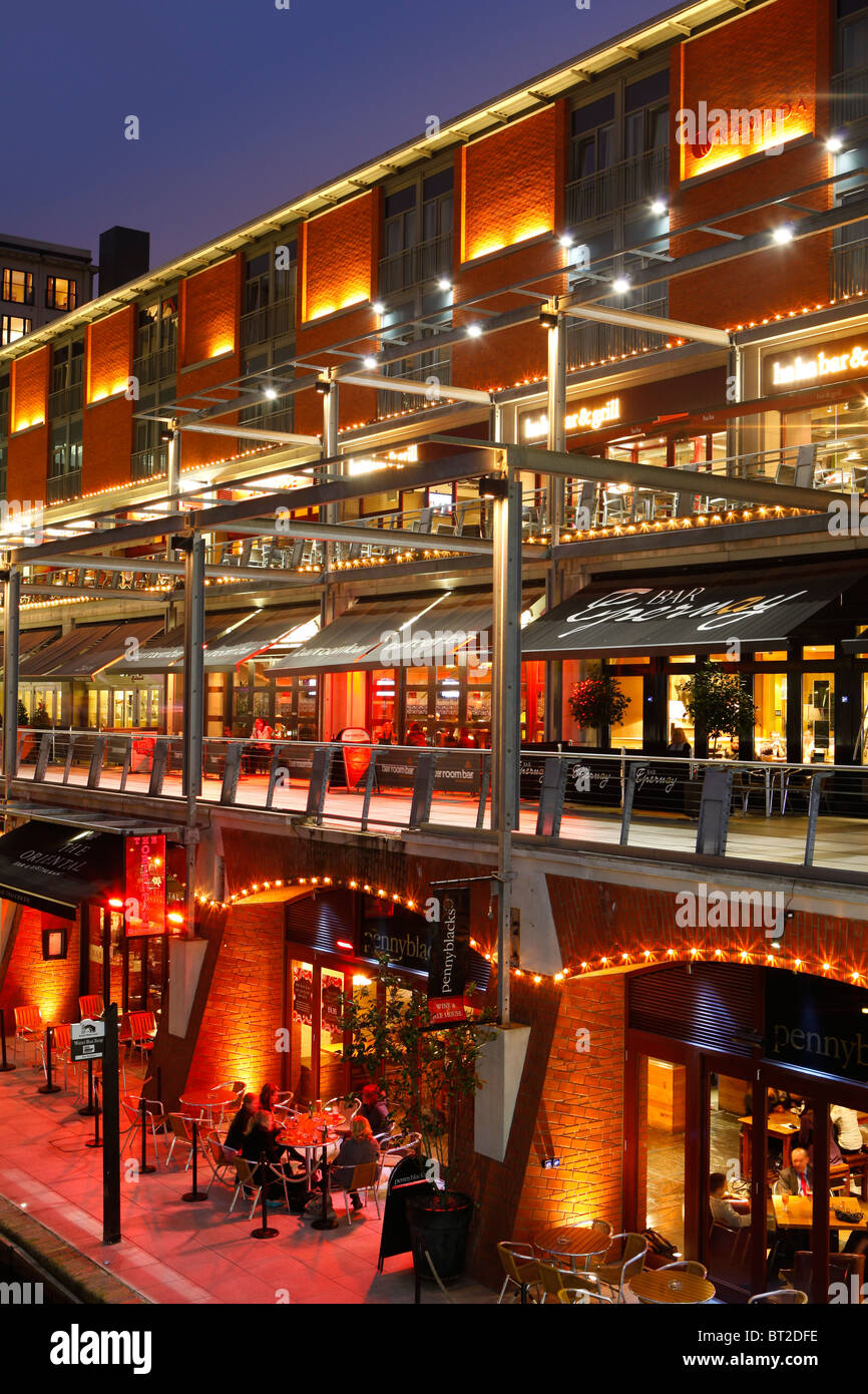 The Mailbox development at night, showing bars and restaurants along