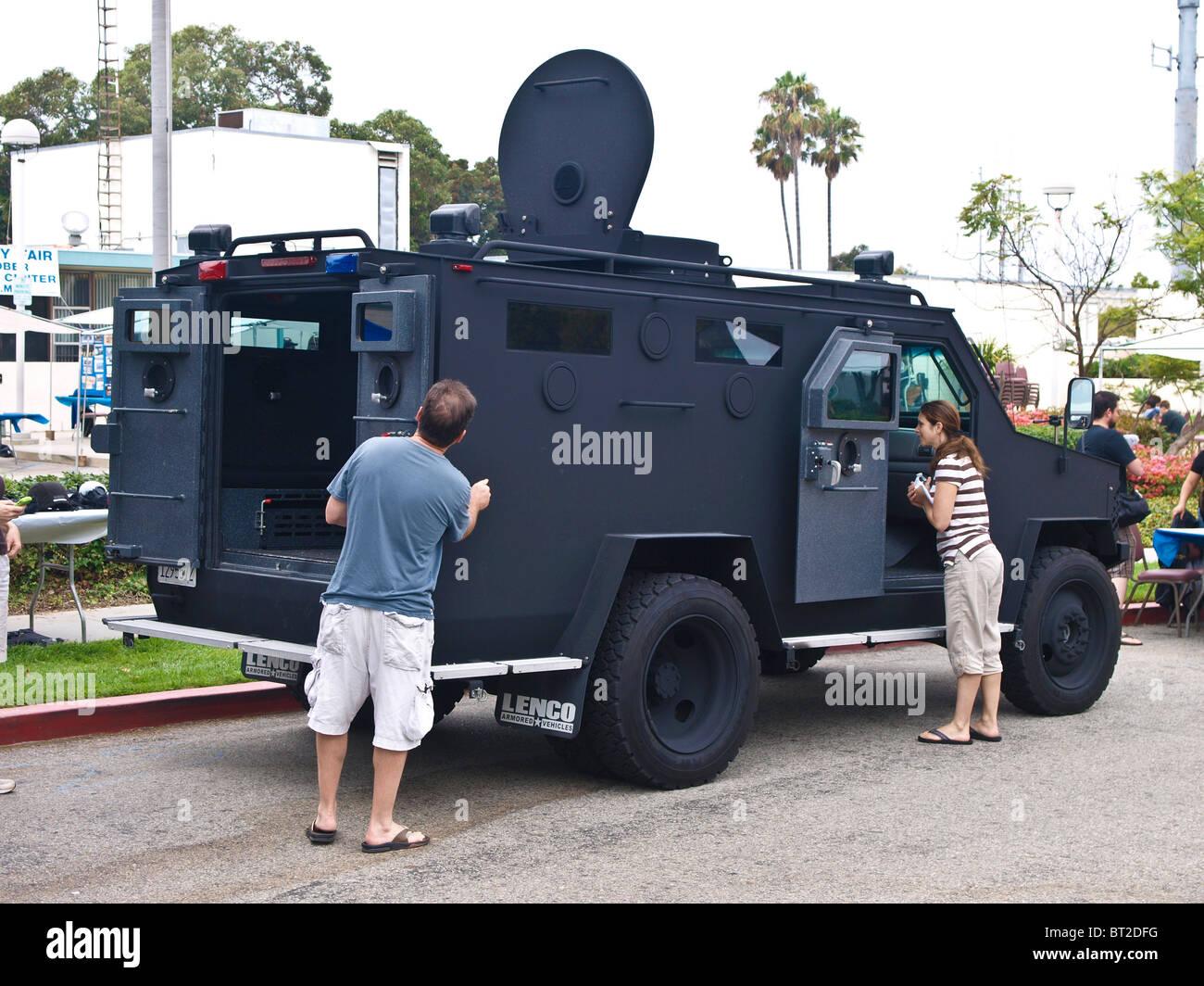 Attendees inspect the Redondo Police  SWAT armored assault vehicle. Stock Photo