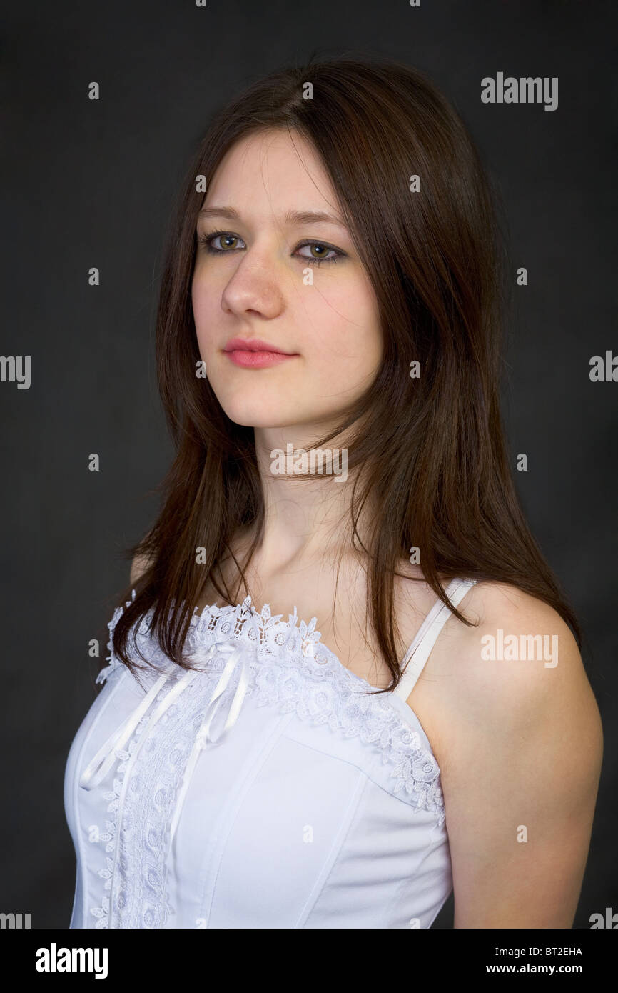 Portrait of the beautiful young woman on a black background Stock Photo ...