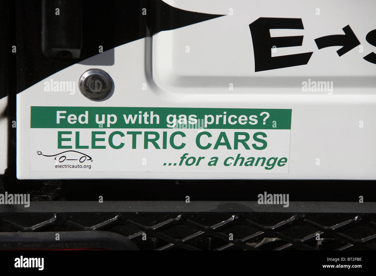 Close up stock photo of a symbol on a hybrid car on display promoting alternative transportation Stock Photo