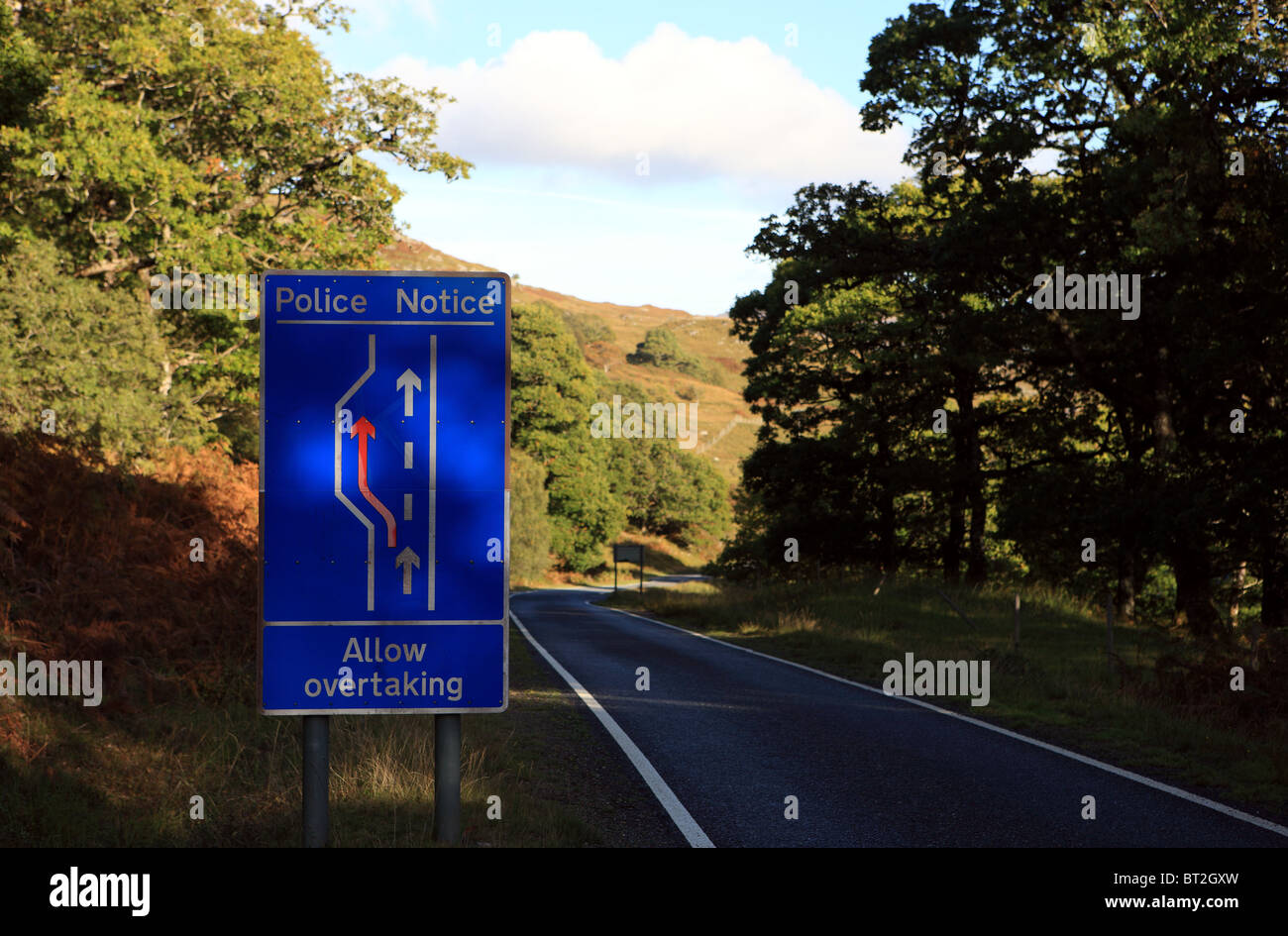 Allow overtaking notice on a single track road in Argyll Scotland Stock Photo