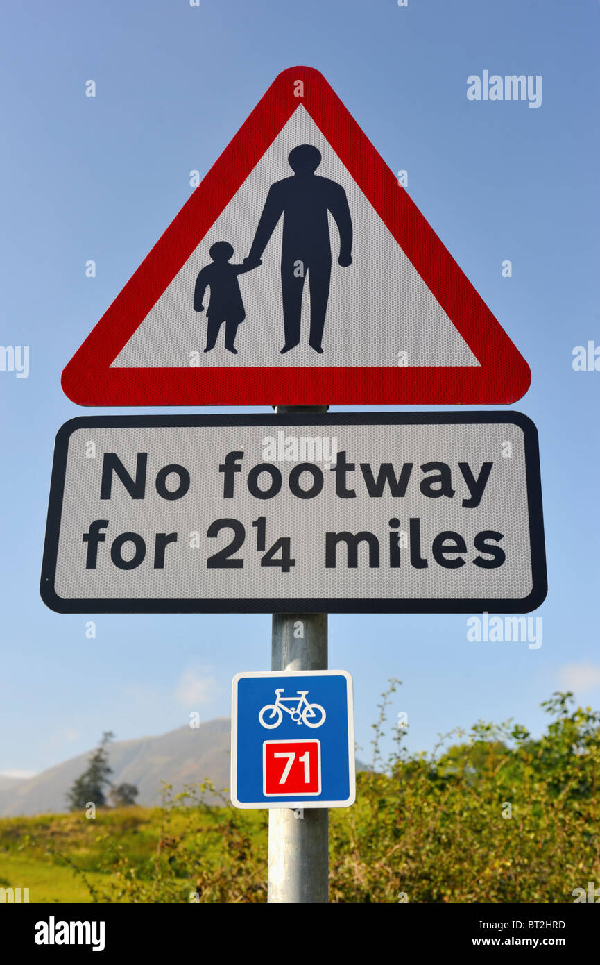 Road sign.'No footway for 21/4 miles'. Loweswater, Lake District National Park, Cumbria, England, United Kingdom, Europe. Stock Photo