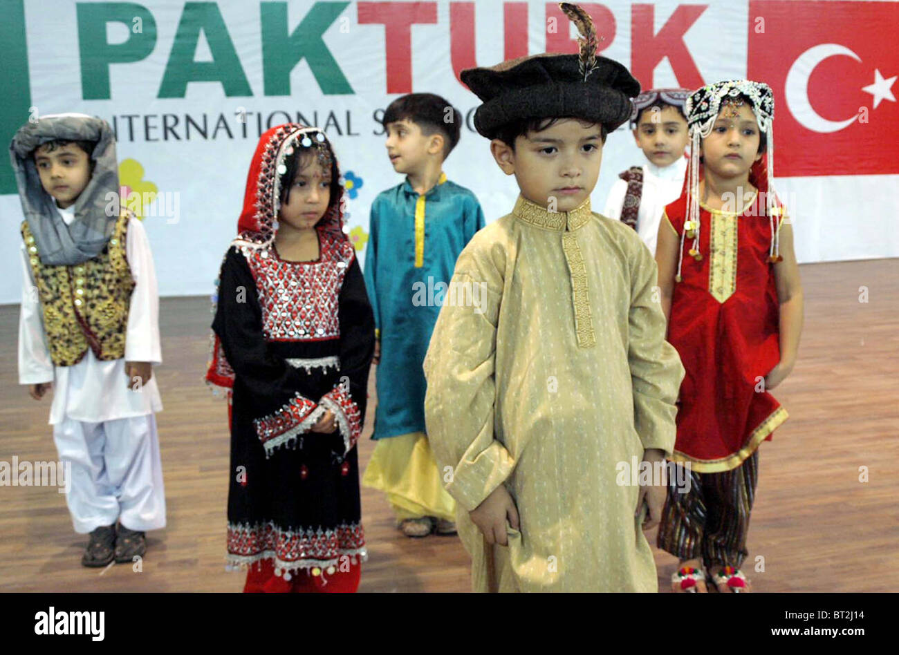 Students perform tableau on stage during Annual ceremony of Pak Turk ...