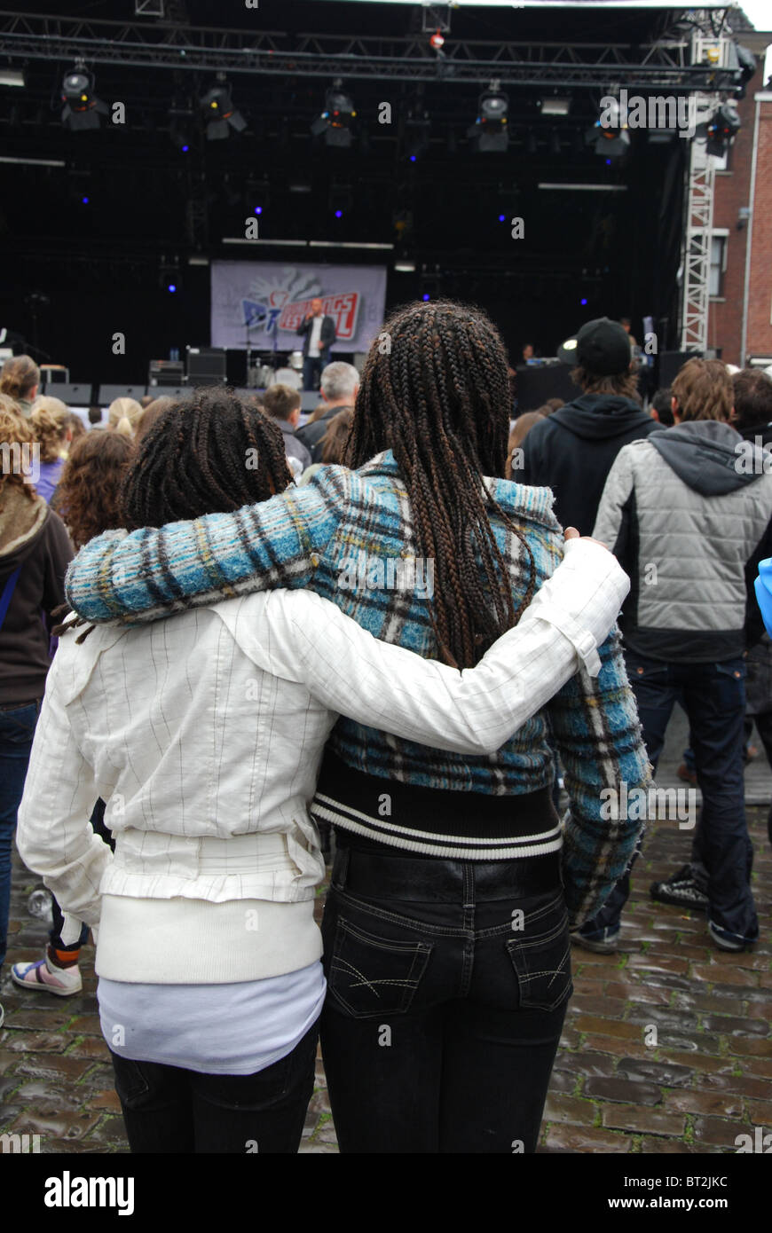 rasta couple in the crowd at rock concert Stock Photo