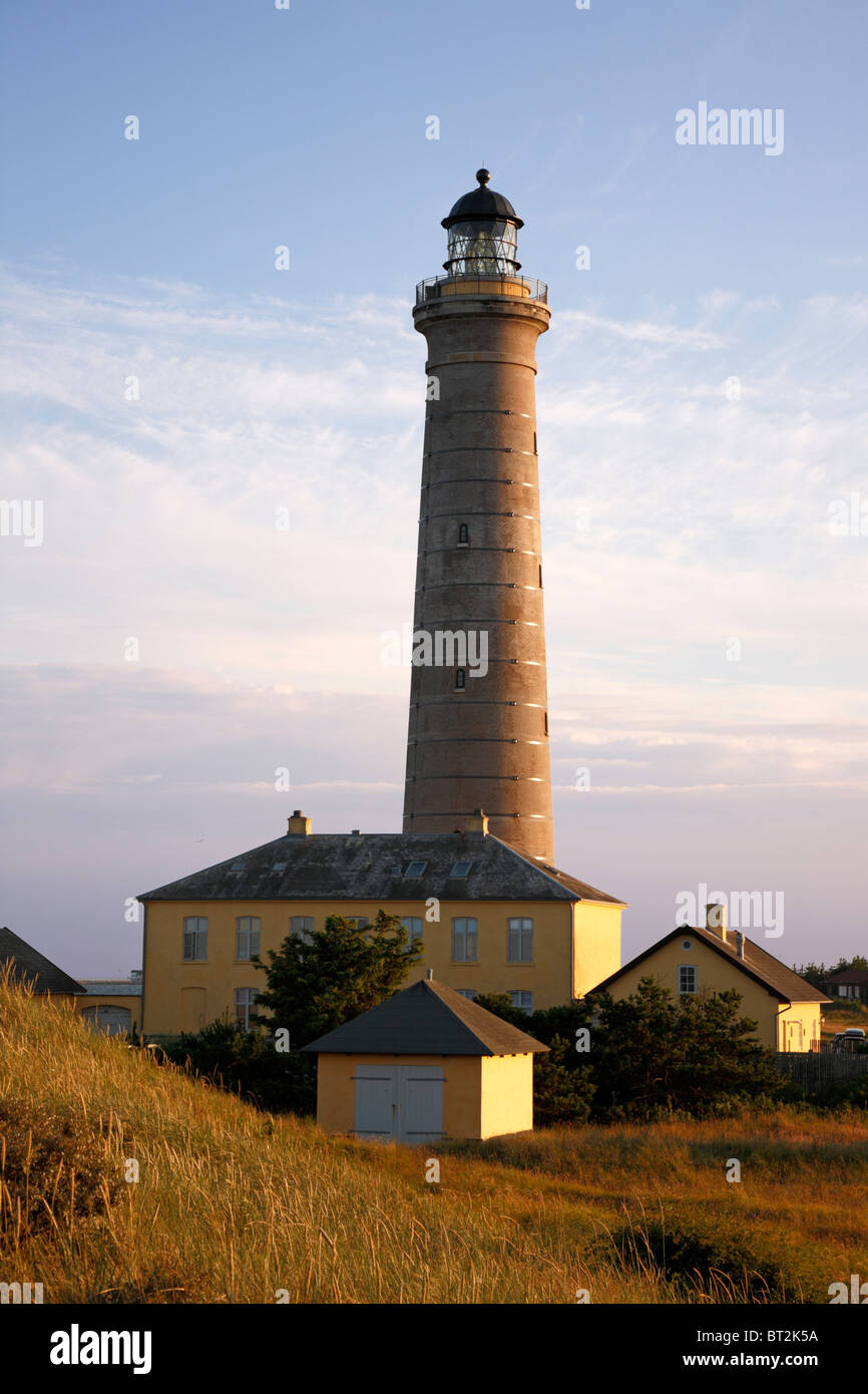 Skagen lighthouse at northernmost point of the Danish peninsular Jutland in  the sunset Stock Photo - Alamy
