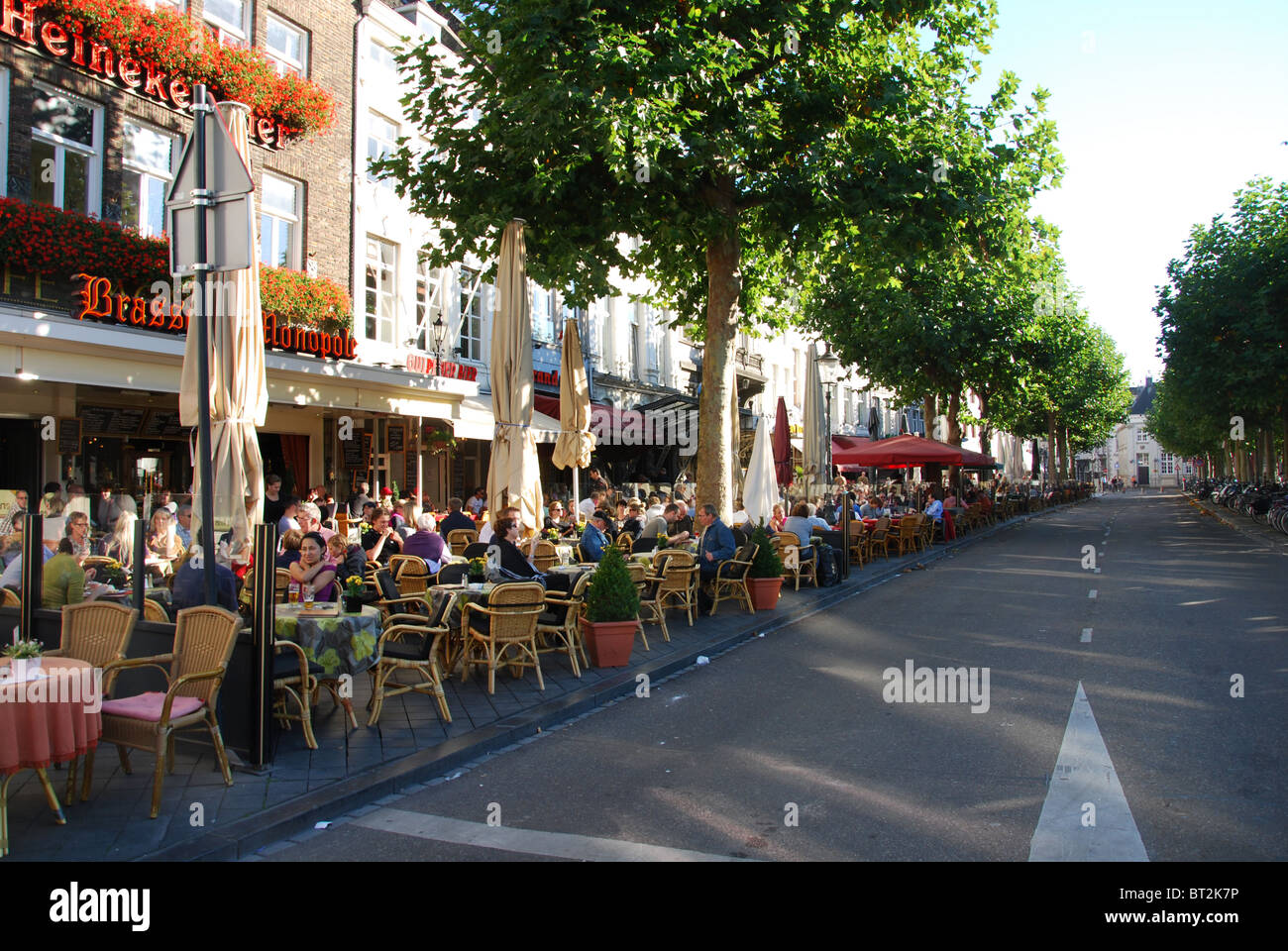 tourists having a drink at bars and pubs Vrijthof Maastricht Stock Photo