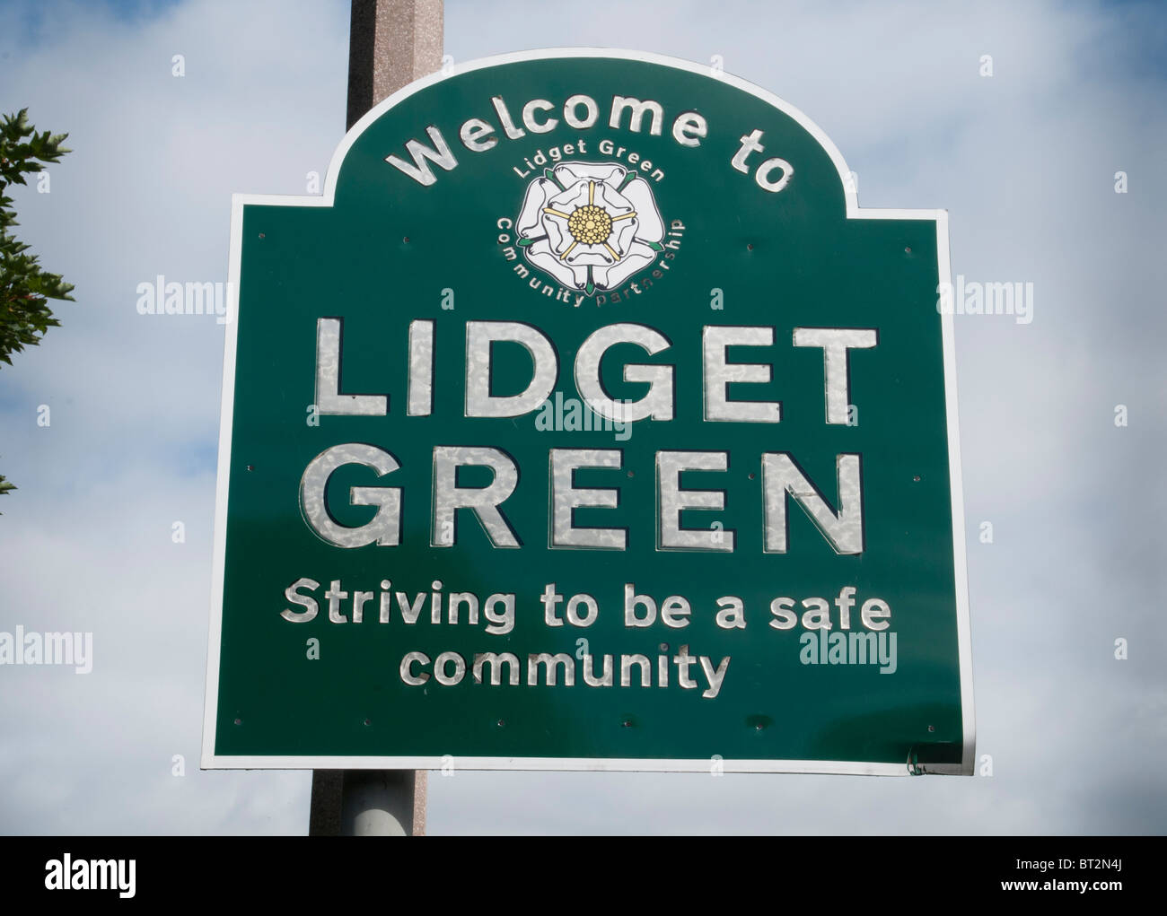 Sign which says 'Lidget Green striving to be a safe community.' Bradford West Yorkshire Stock Photo