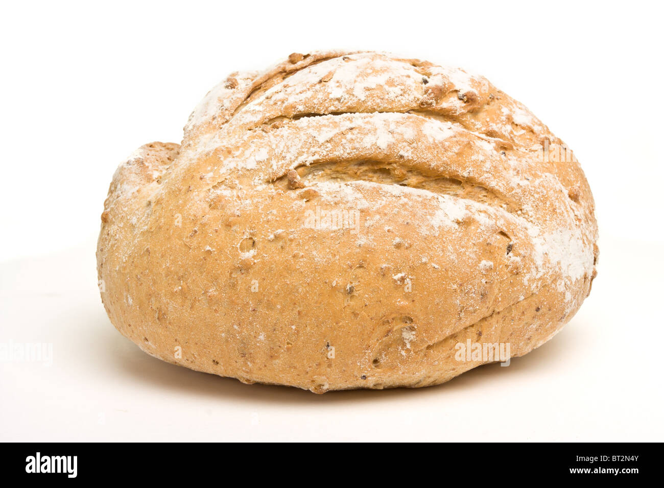 Handmade Spelt n Rye Bread from low perspective isolated on white. Stock Photo