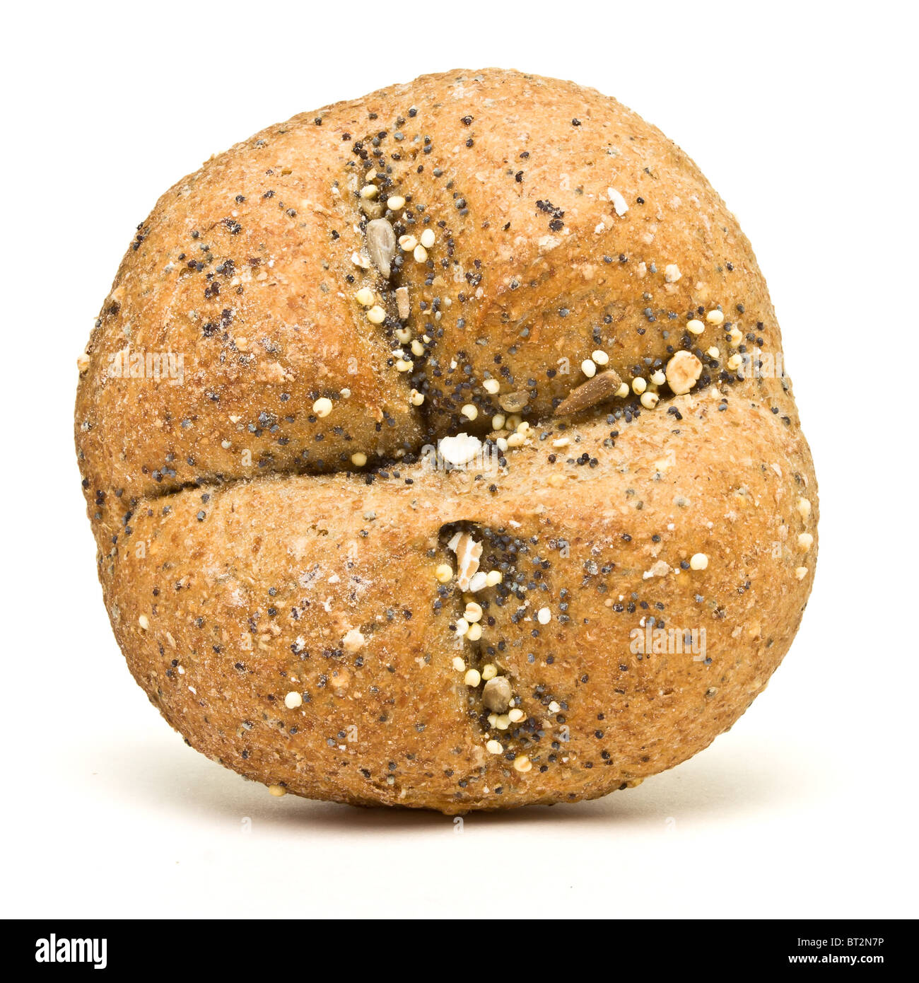 Handmade bread roll from low perspective isolated against white. Stock Photo