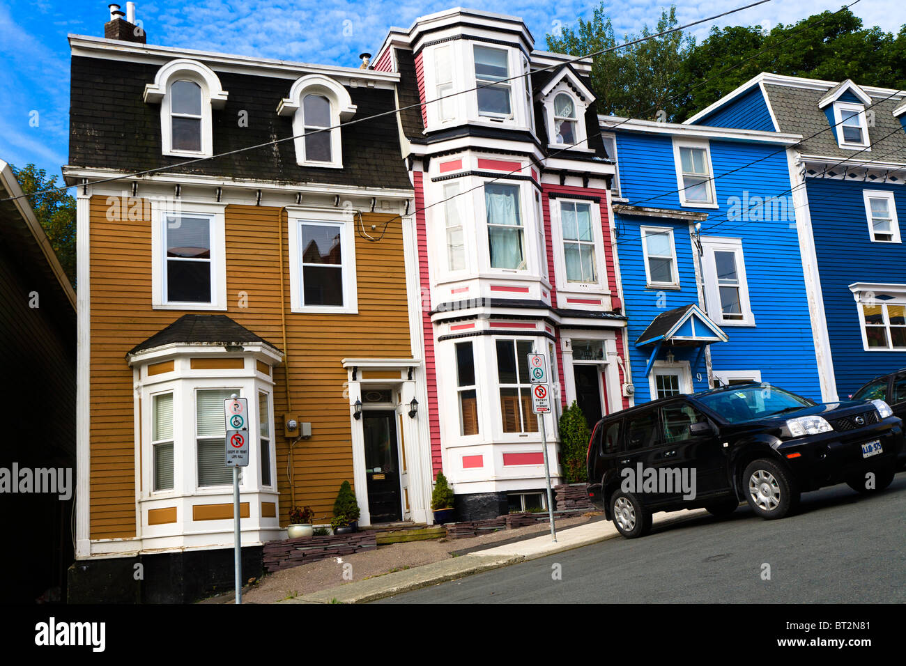 Brightly coloured terraced houses in Water Street in downtown, St. John