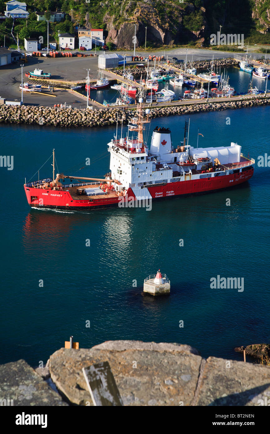 Canadian Coastguard vessel Ann Harvey passing through 'The Narrows' out of St Johns harbour Newfoundland, Canada. Stock Photo