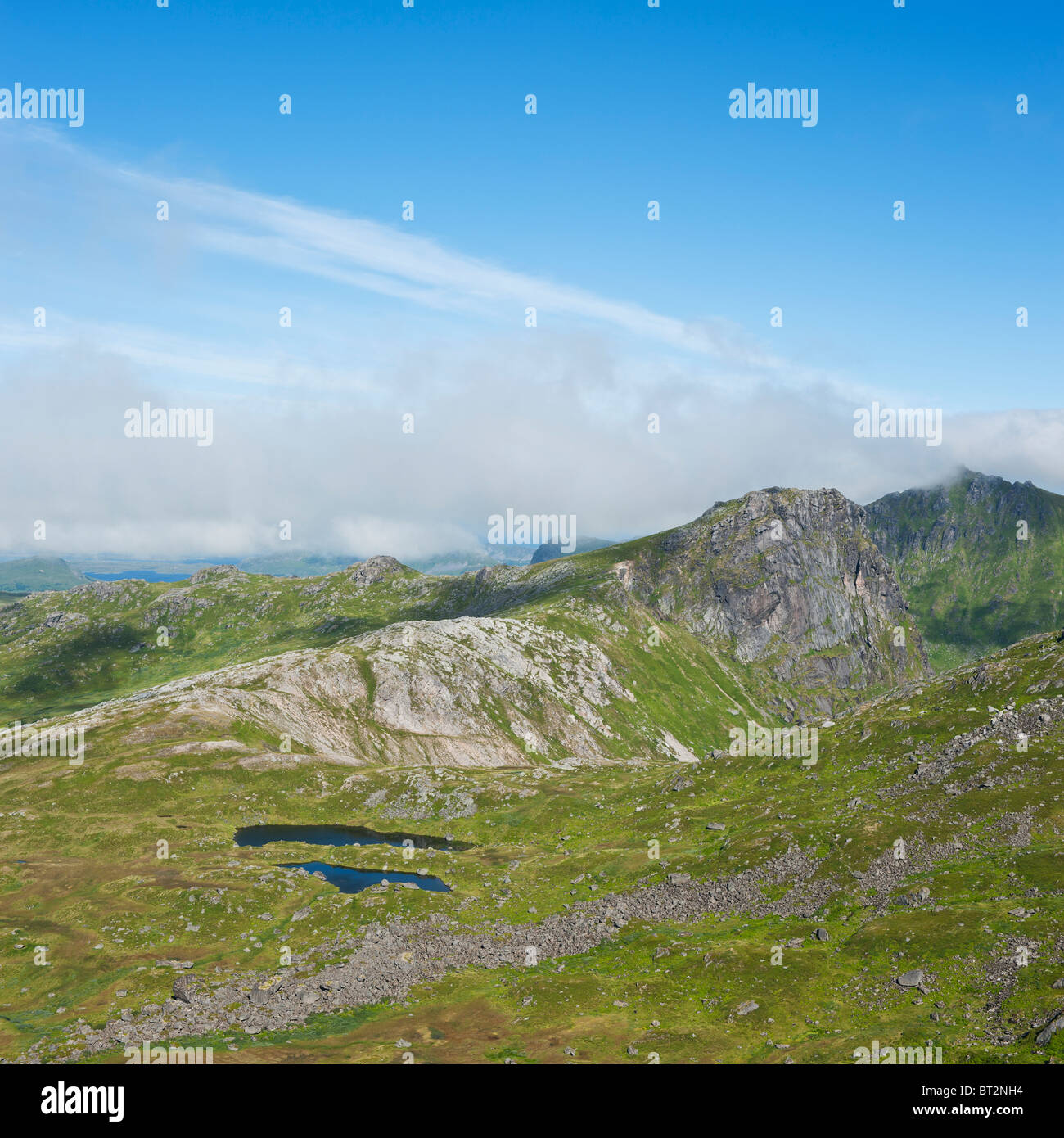 Rugged mountain landscape in summer, near Justadtind, Vestvagoy, Lofoten islands, Norway Stock Photo