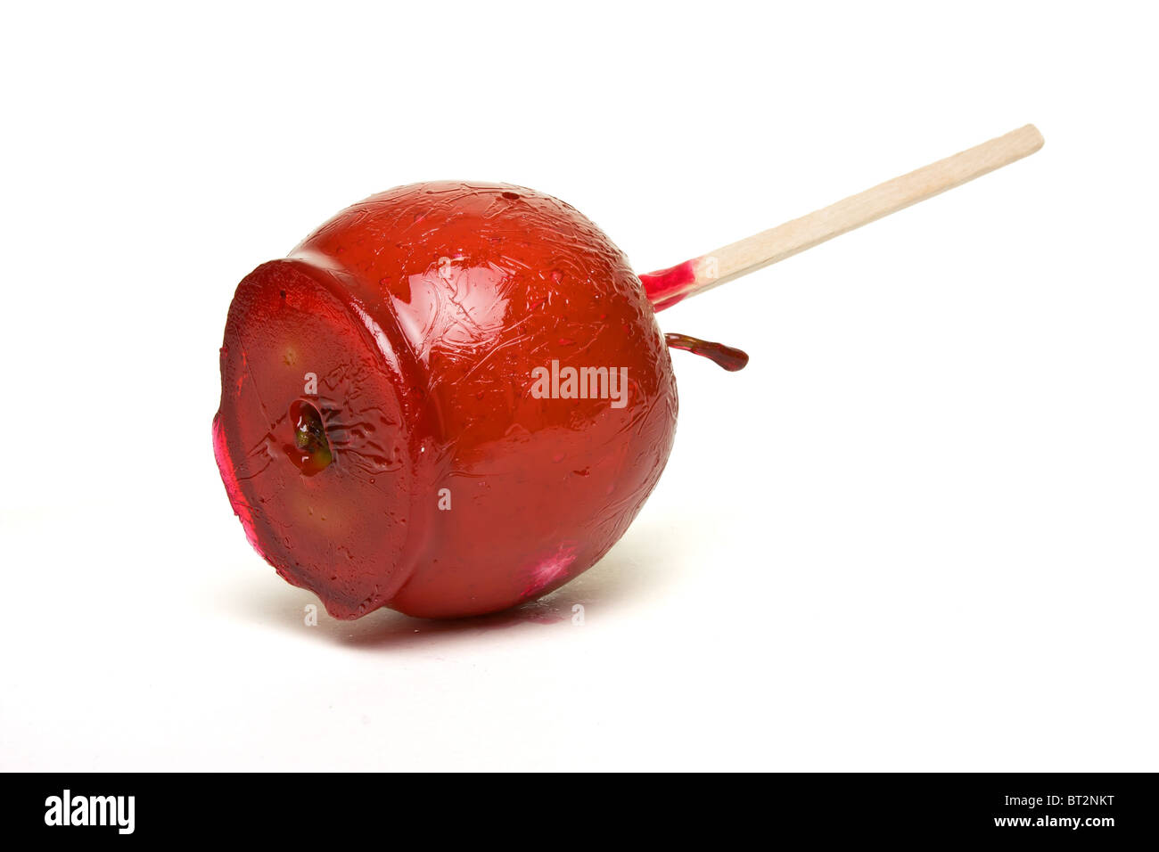 Toffee apple from low perspective isolated on white Stock Photo Alamy