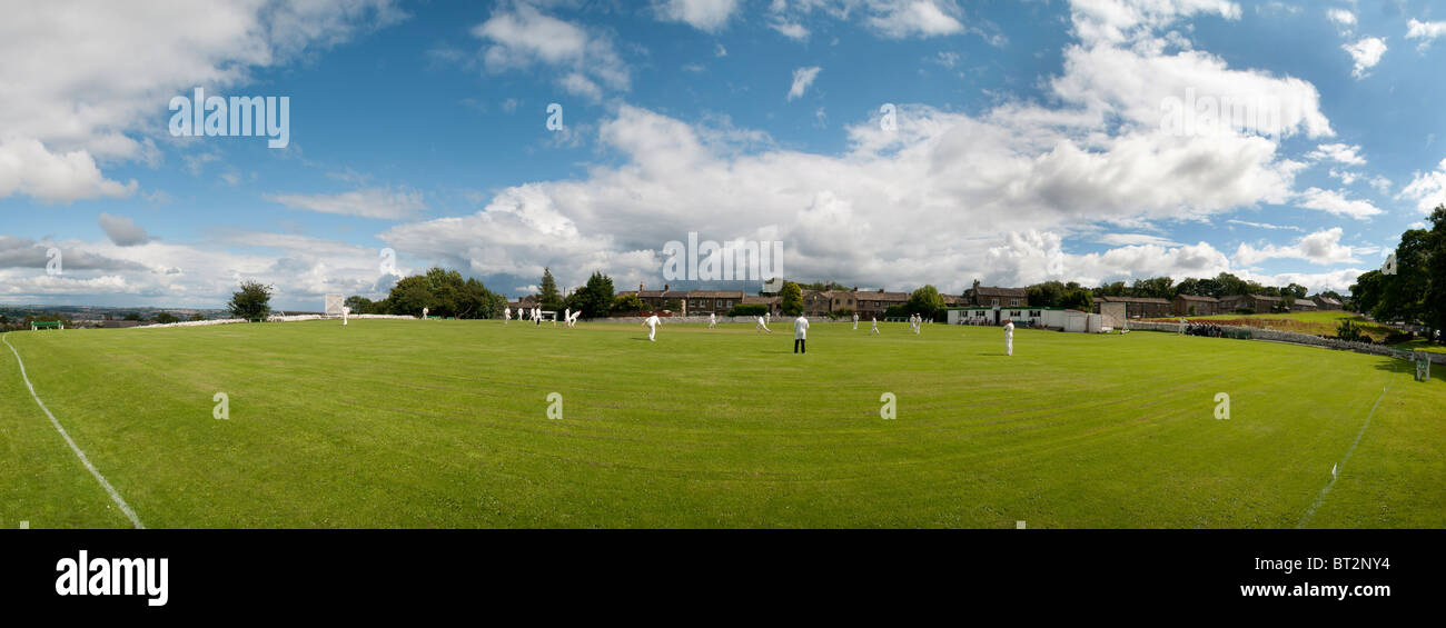 Clayton Cricket Club playing Greetland in the Halifax Cricket League Stock Photo