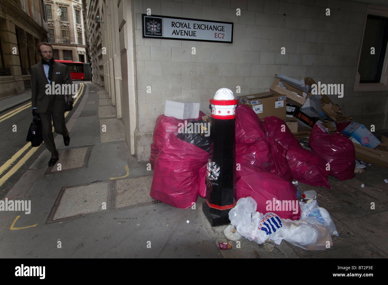 Rubbish piled up in the city of London, bags of trash litter Royal exchange avenue Stock Photo
