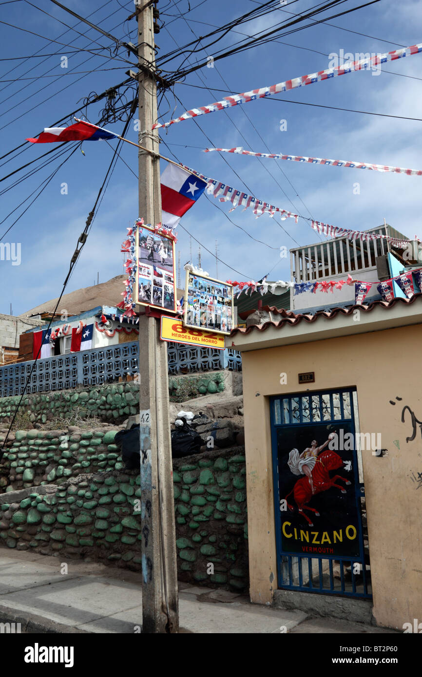 Houses decorated with Chilean flags for the bicentenary of the establishment of the First Government Junta of Chile on 18th September 1810, Arica Stock Photo