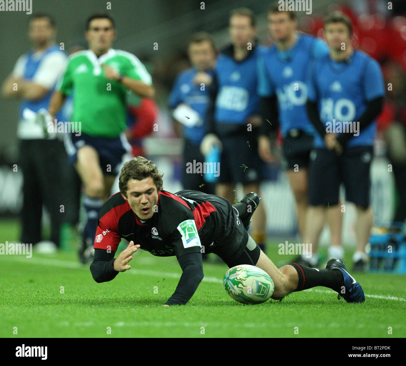 Alex Goode of Saracens fell down with the ball on the pitch during the Heineken Cup Rugby match Saracens v Leinster. Stock Photo