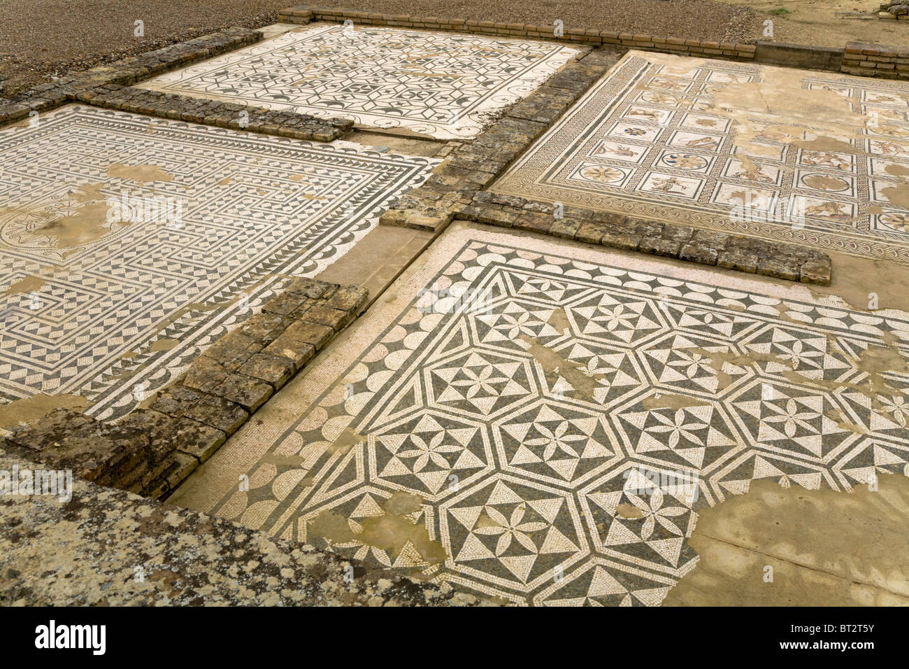 Mosaic floor in the House of Casa de Neptuno / Neptune 's villa / house, in Roman city of Italica / Itálica near Seville, Spain. Stock Photo