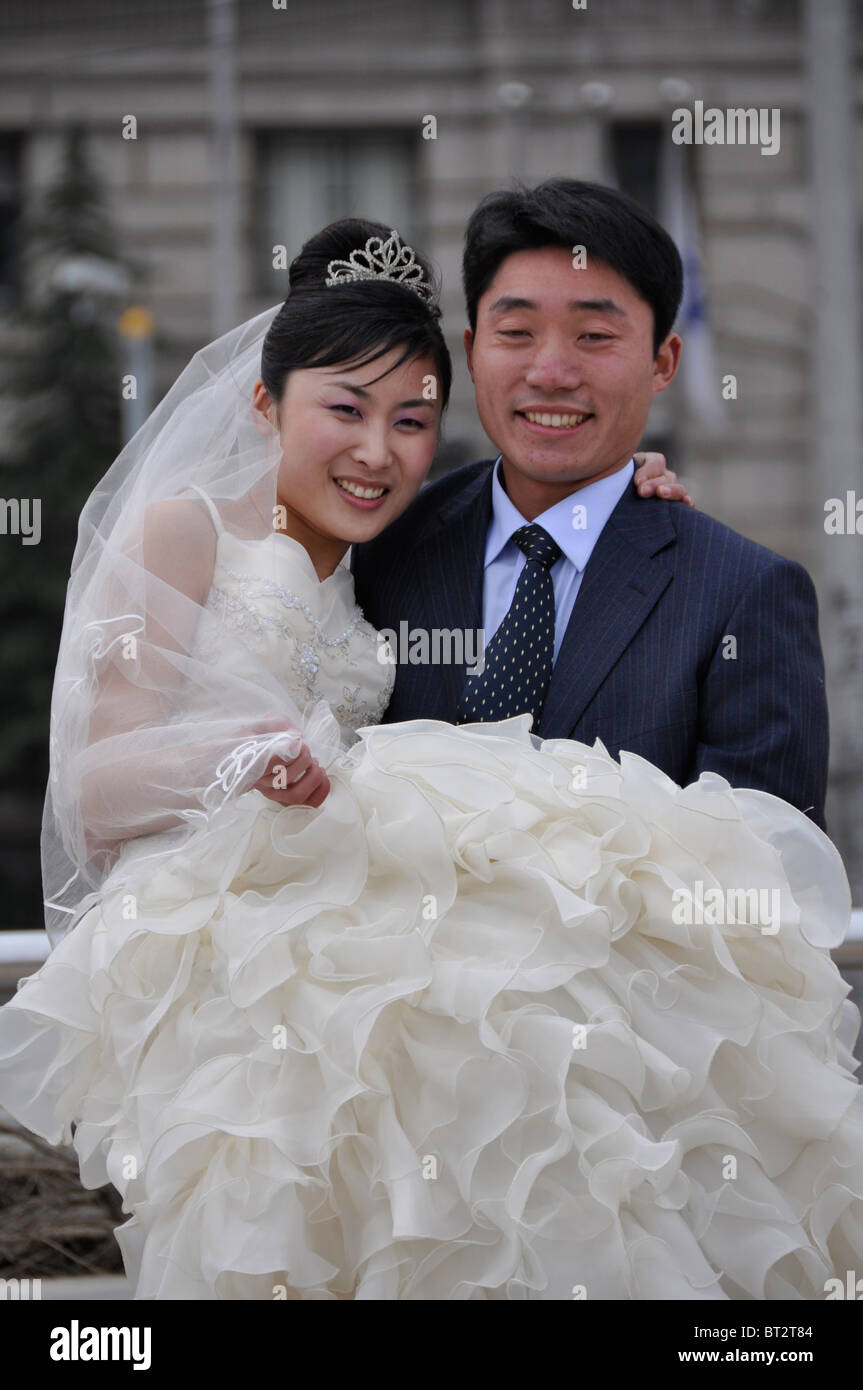 Chinese Couple Getting Married on Bund in Shanghai, China Stock Photo