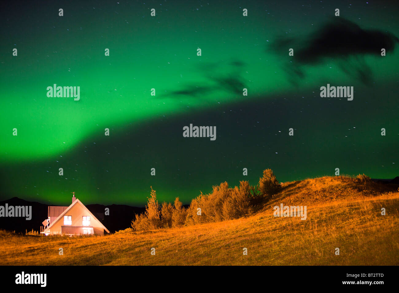 The Northern Lights or Aurora Borealis over Iceland's south Coast, at ...