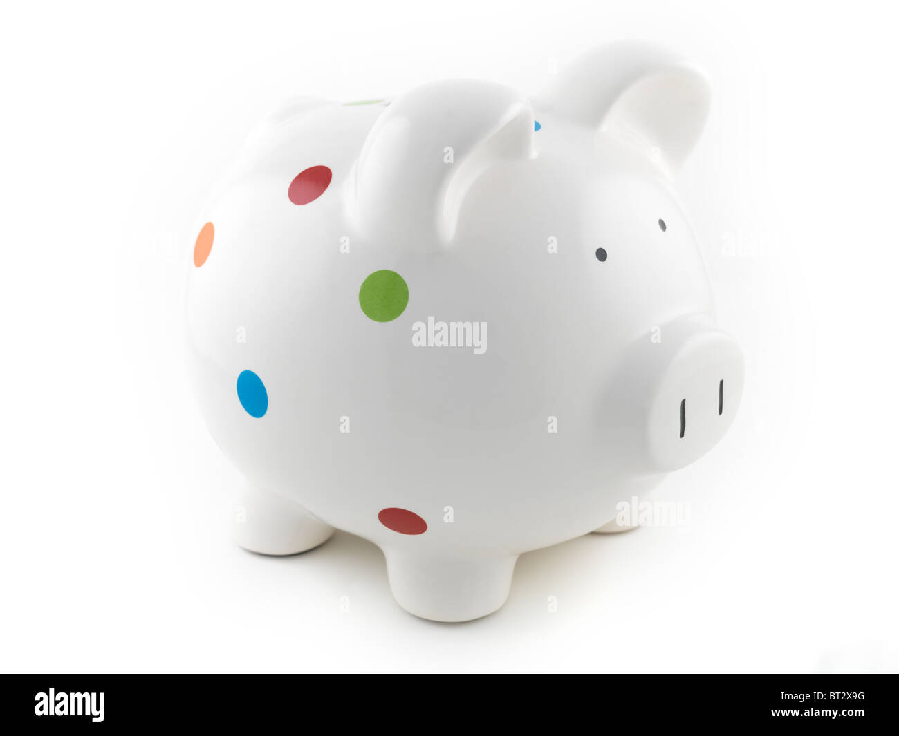 A piggy bank isolated against a white background Stock Photo - Alamy