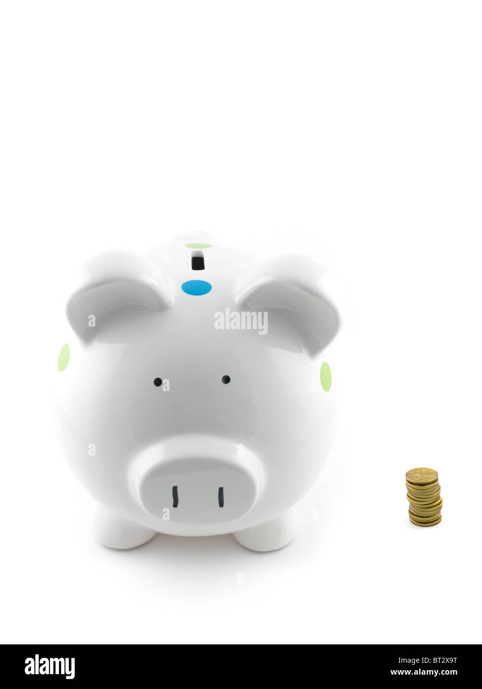 A piggy bank isolated against a white background Stock Photo - Alamy