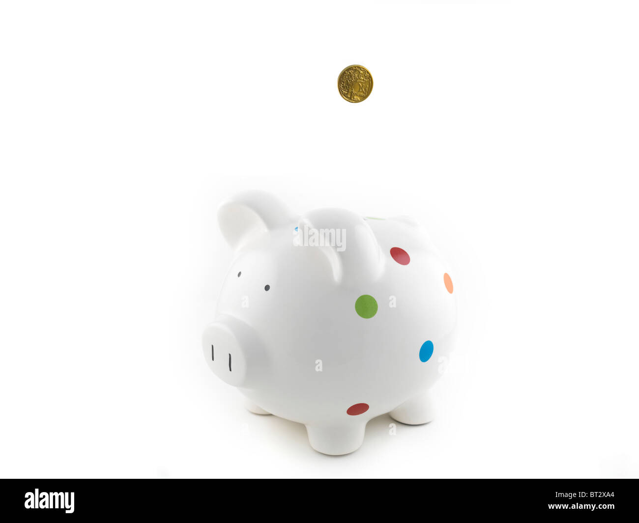 A piggy bank isolated against a white background Stock Photo - Alamy
