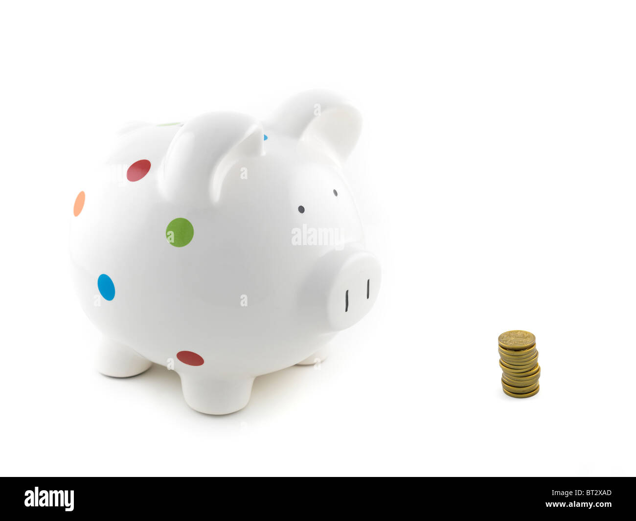 A piggy bank isolated against a white background Stock Photo - Alamy