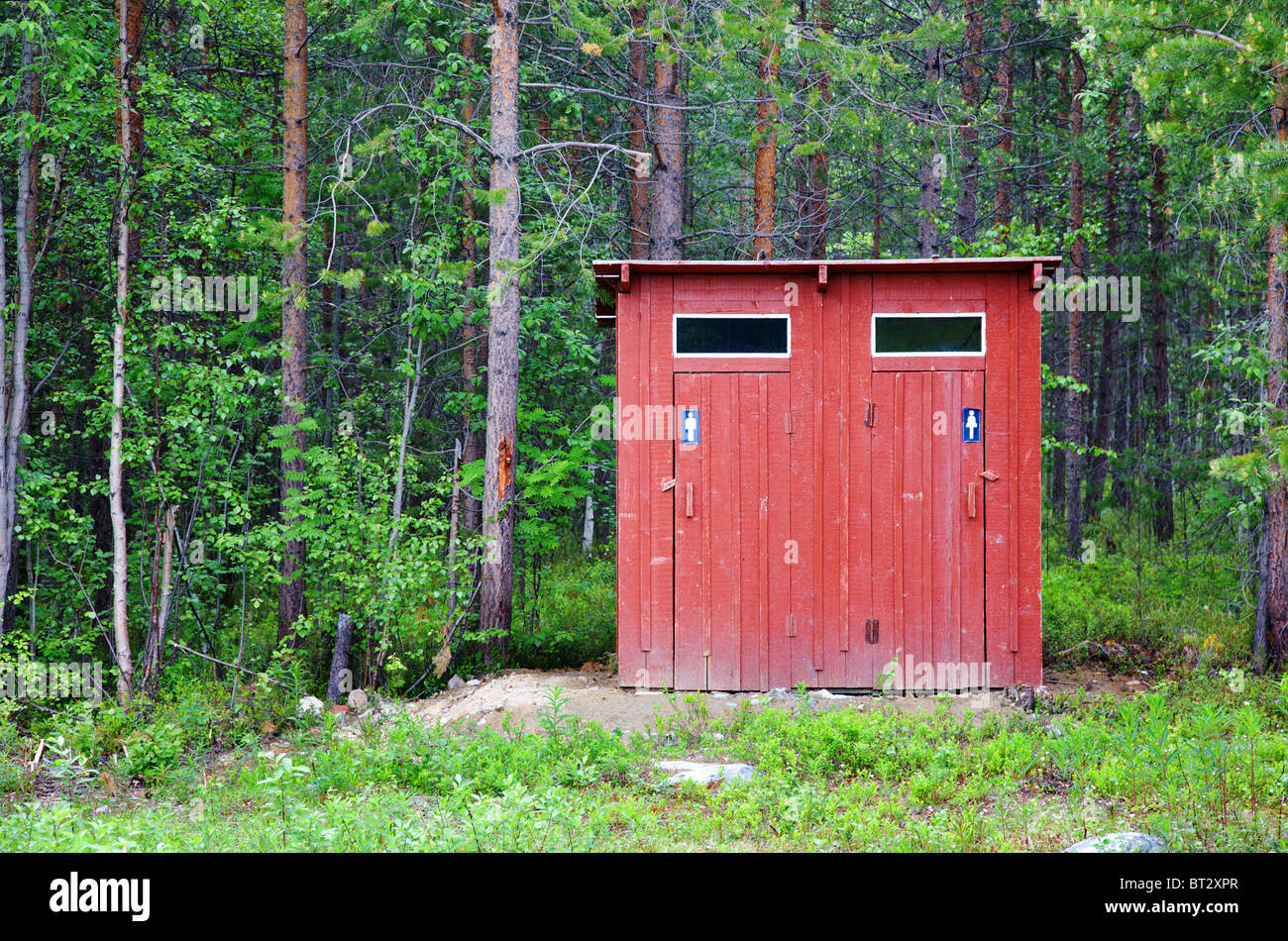 Public toilet in a wood Stock Photo Alamy