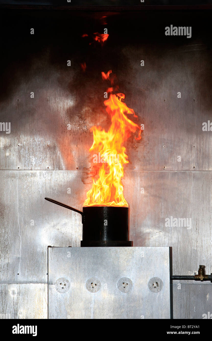 A simulated Chip (fries) pan fire with burning oil on a gas stove Stock