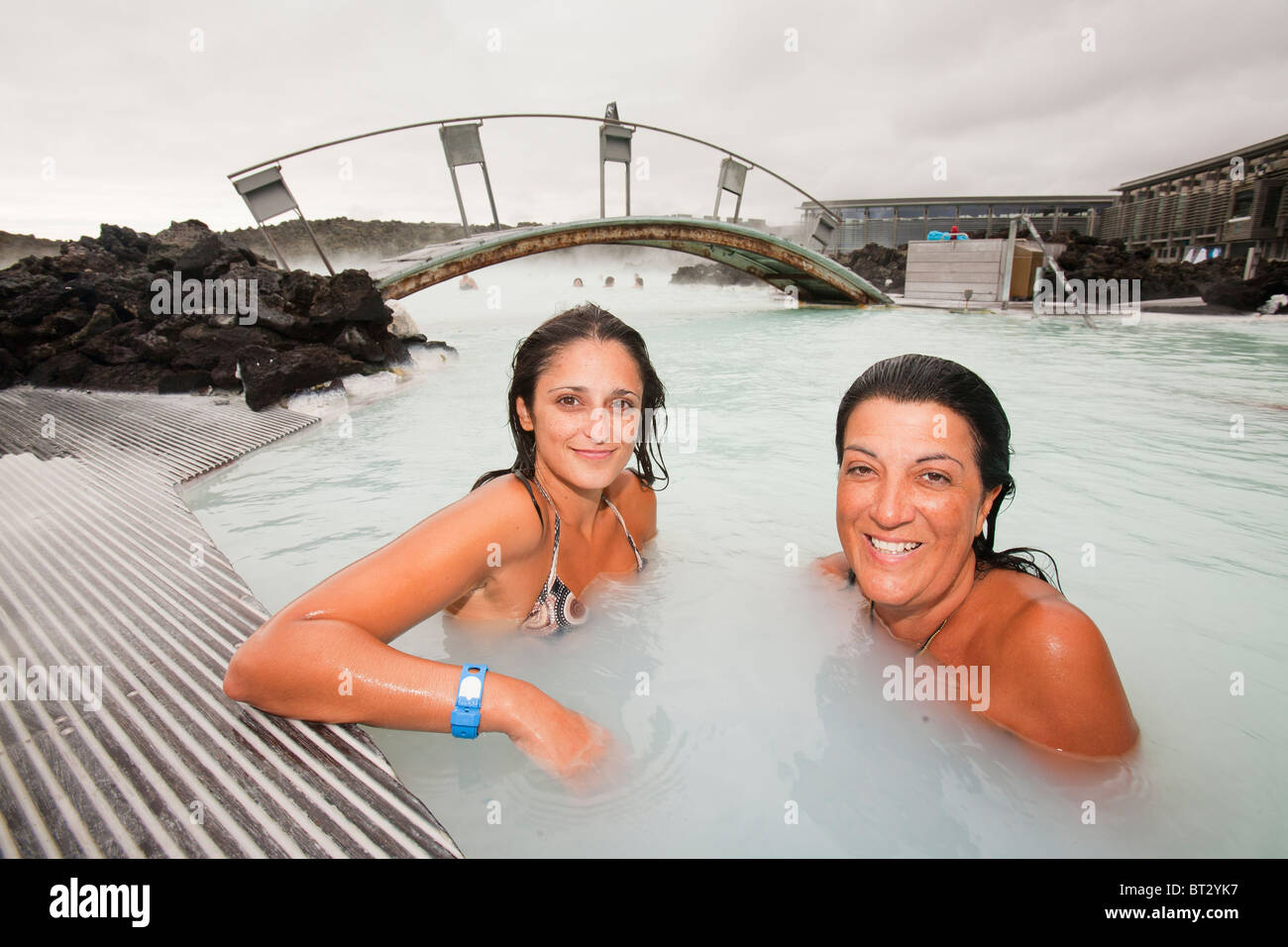 Two Spanish ladies relaxing at the Blue Lagoon near at Keflavik in Iceland. Stock Photo