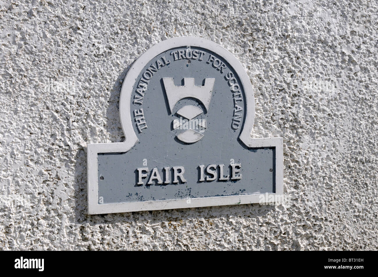 Sign when you land at Fair Isle declaring he National Trust for Scotland Stock Photo