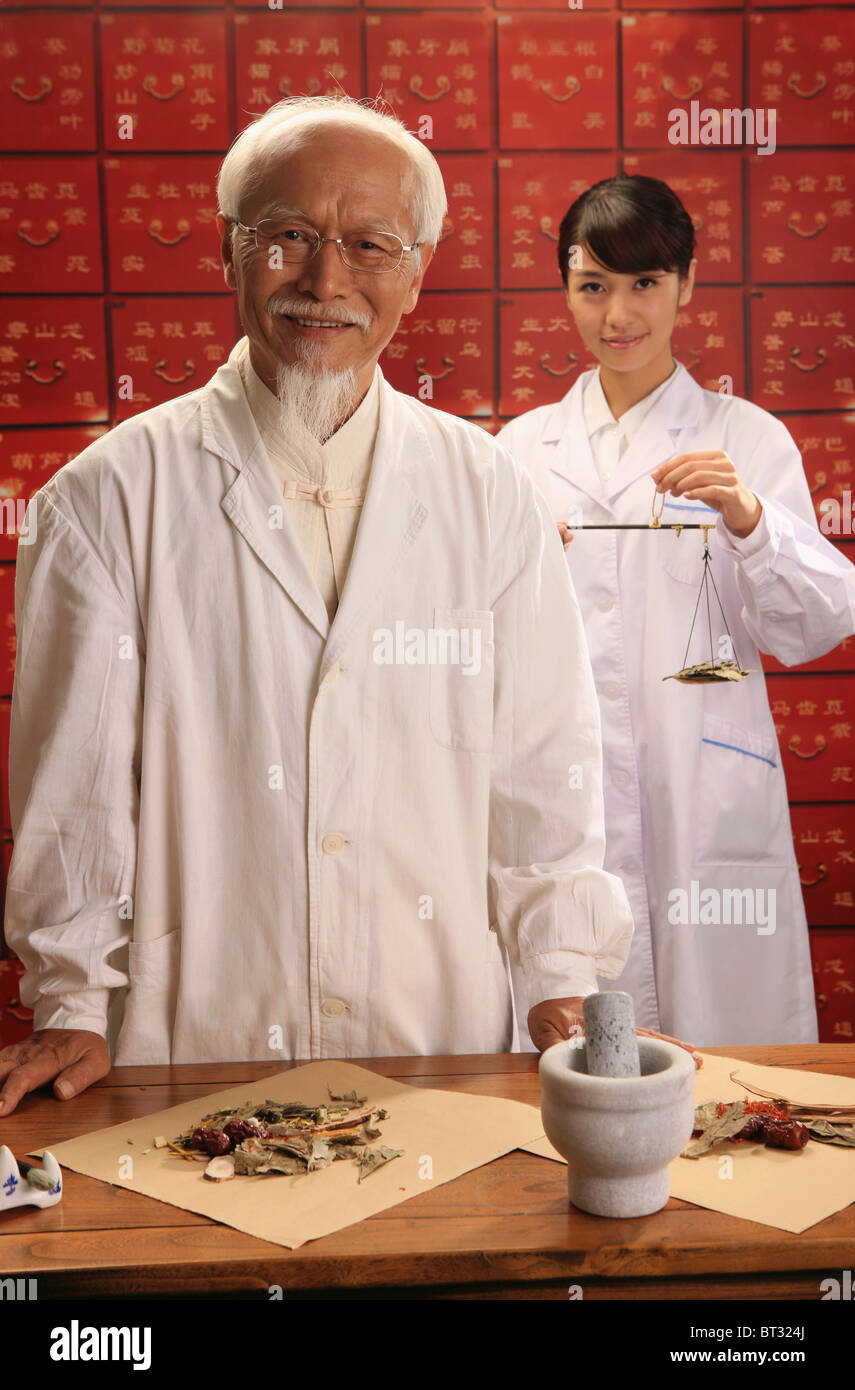 herbalist doctors in store Stock Photo Alamy