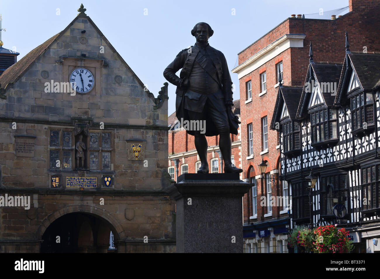 Shrewsbury market square featuring the 16th century market hall and statue of Clive of India. Stock Photo