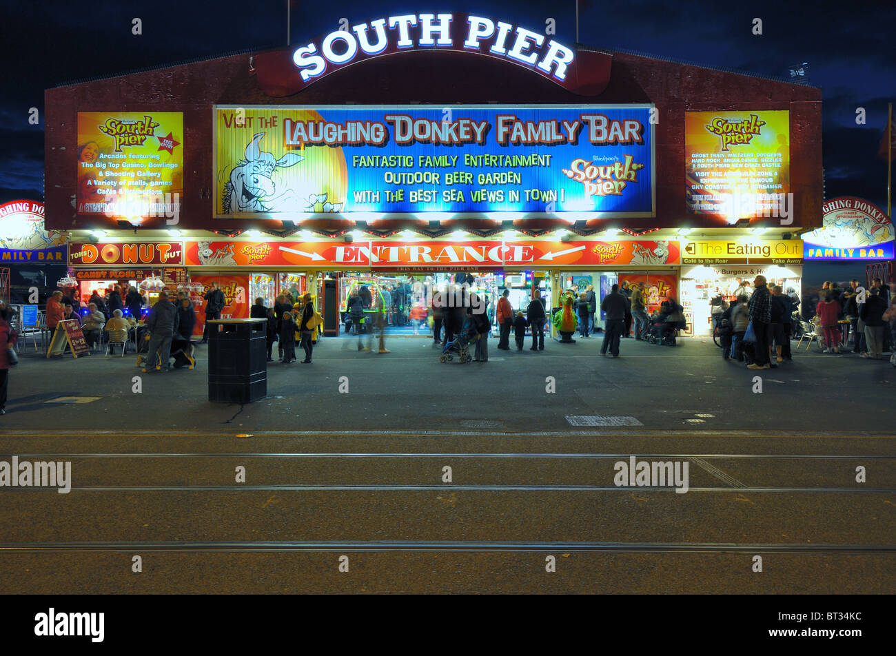 Blackpool South pier as the lights come on Stock Photo Alamy