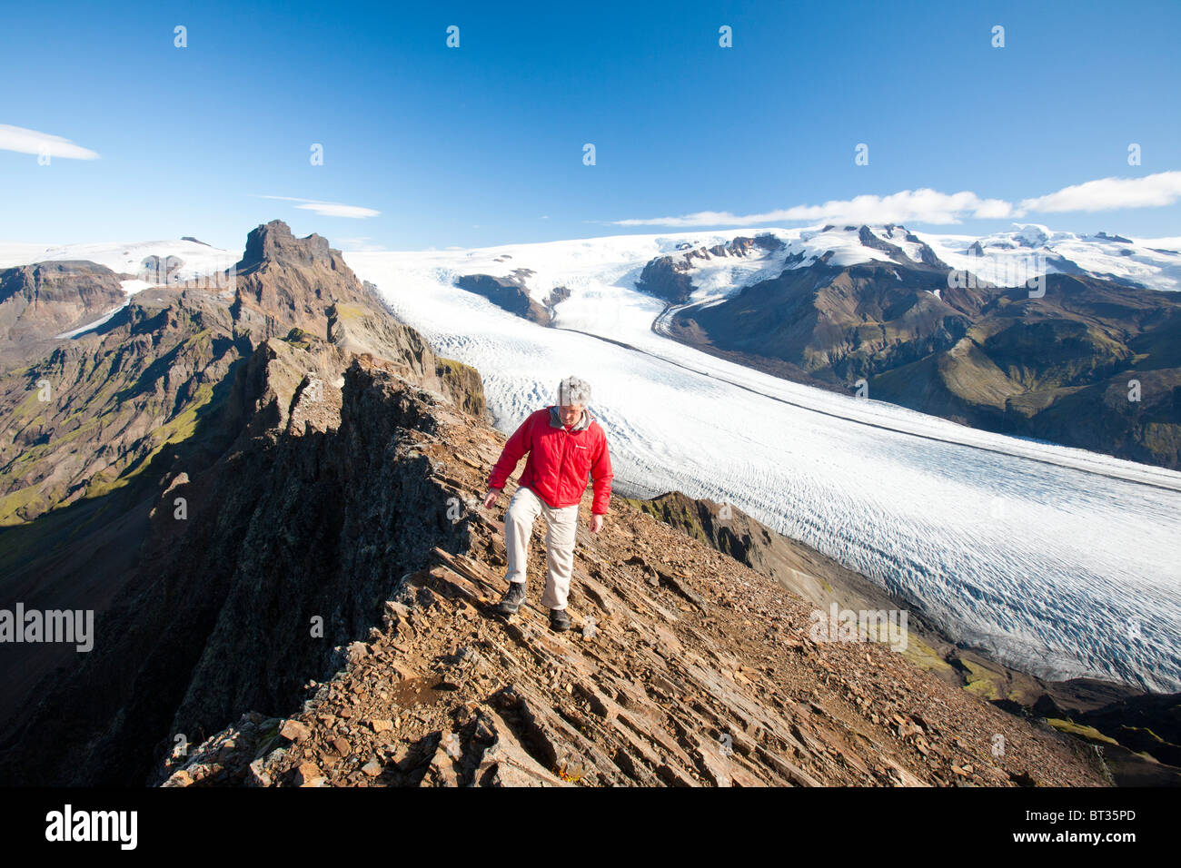 A mountaineer on the summit of Kristinartindar above Skaftafellsjokull