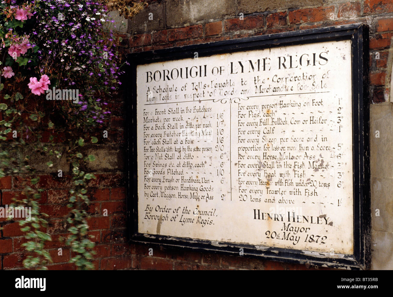 Lyme Regis, Gun Cliff, notice board listing market stall charges dated 1872 Dorset England UK