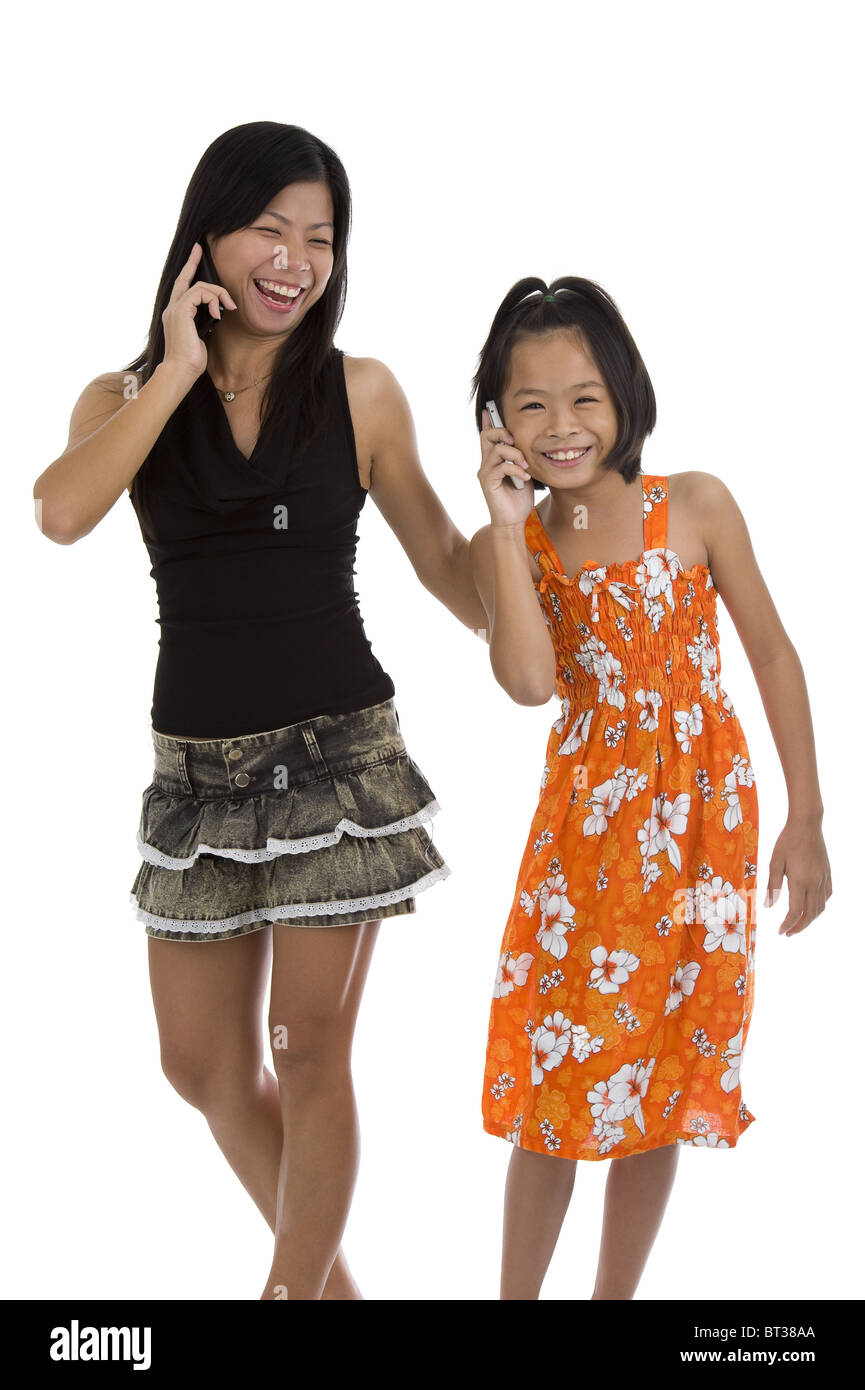 mother and daughter on the phone, isolated on white background Stock ...