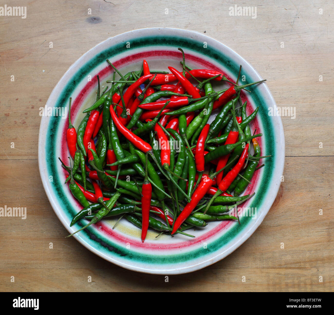 Tabasco sauce and chillies. Stock Photo