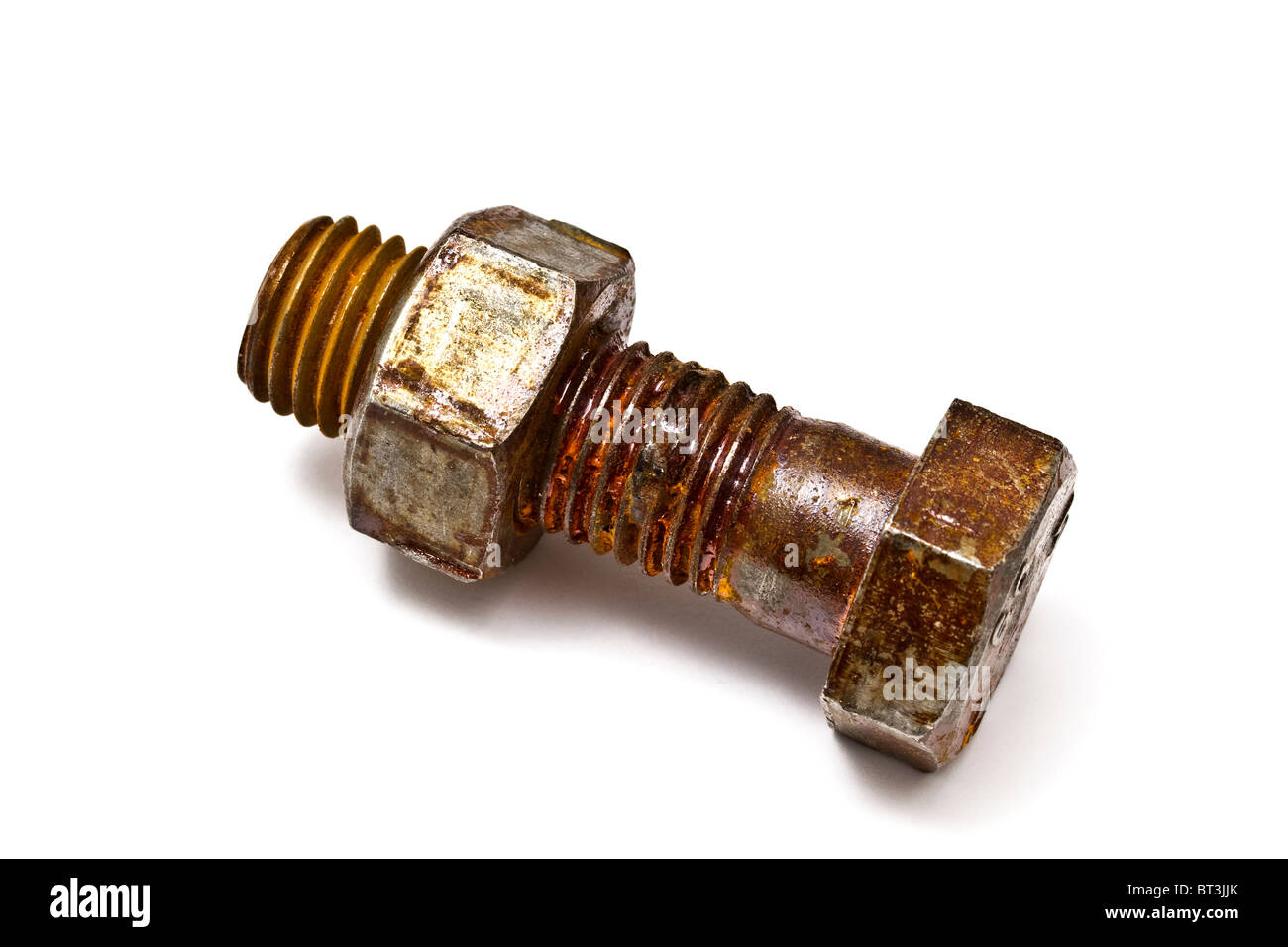 Rusty nut and bolt isolated on white background Stock Photo