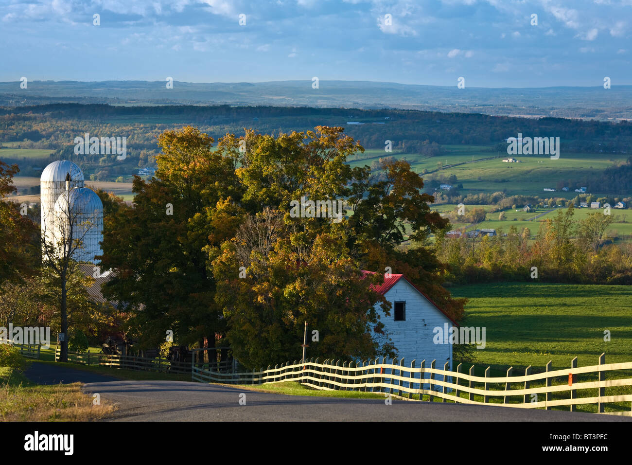 Farm in Upstate NY with Pond and Mountains in the Background Stock