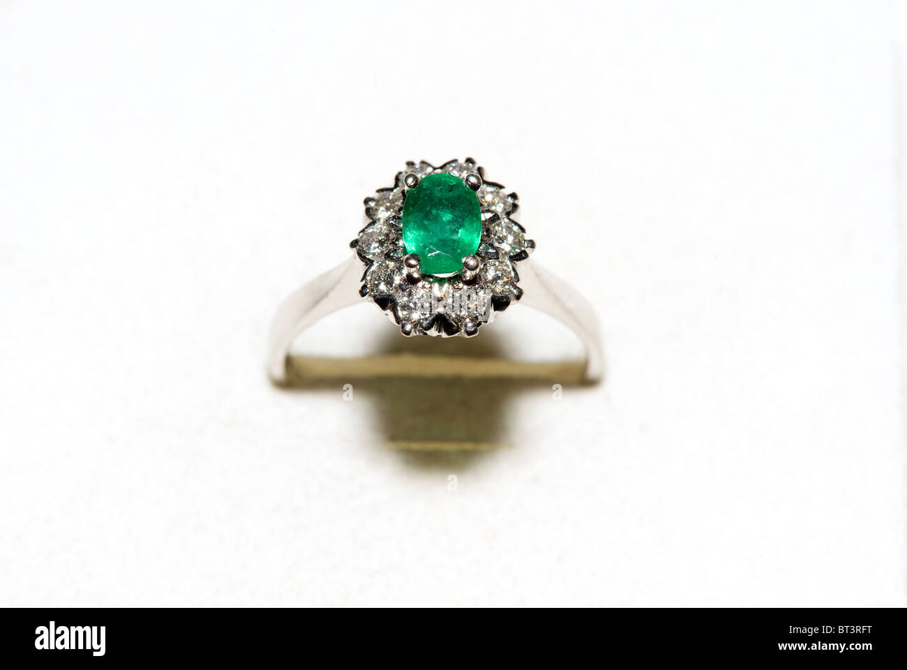 gold jewelry emerald ring with diamonds Stock Photo