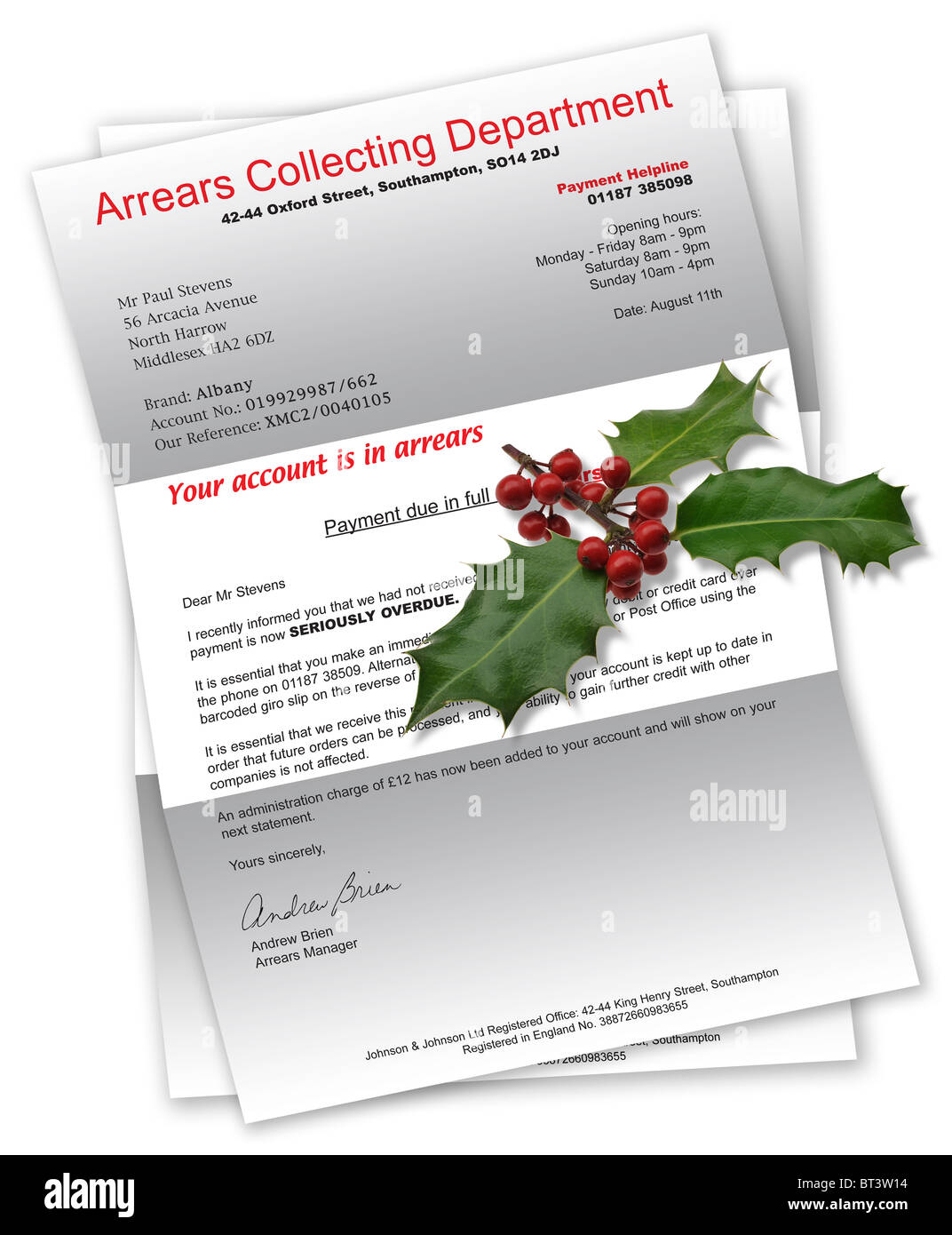 Collection Agency Letter due to unpaid/bad debt with Christmas holly Stock Photo