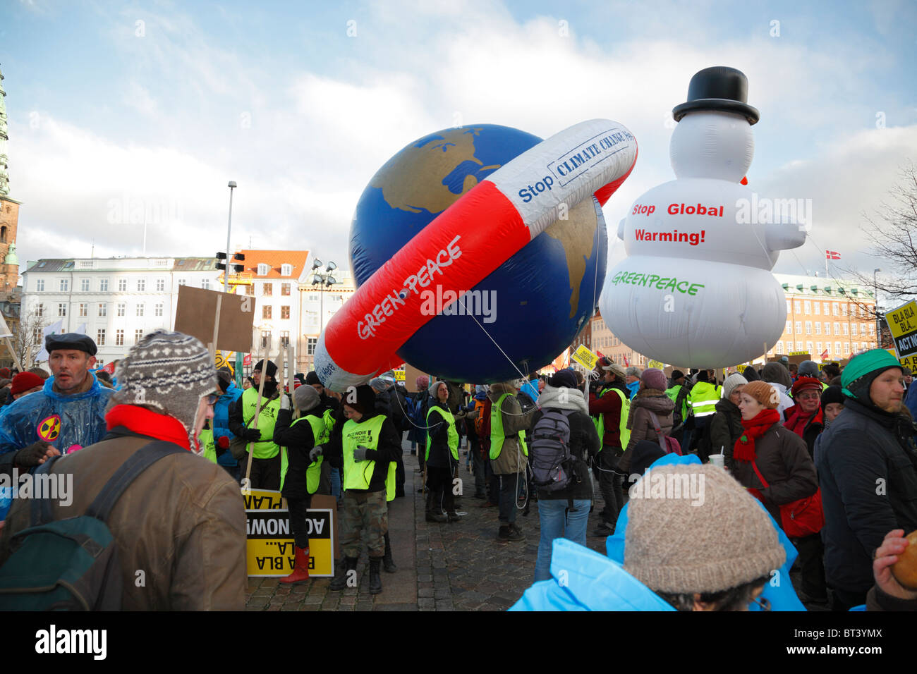 Greenpeace's melting snowman and drowning Earth in front of the Parliament in Copenhagen at the UN Climate Change Conference. Climate march. Stock Photo