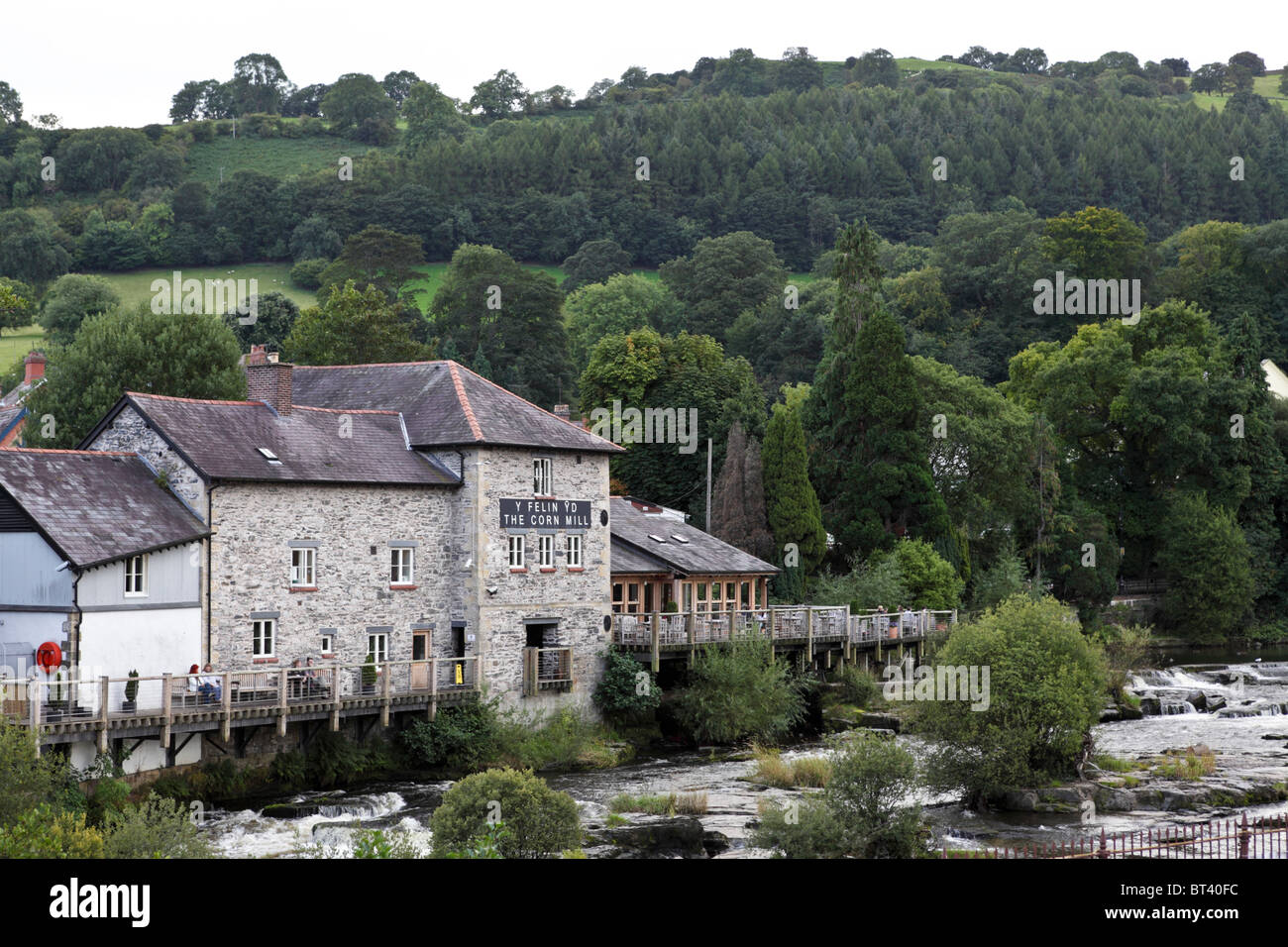 Viewed from Llangollen road bridge, here isThe Corn Mill situated on the south bank of the River Dee. Stock Photo