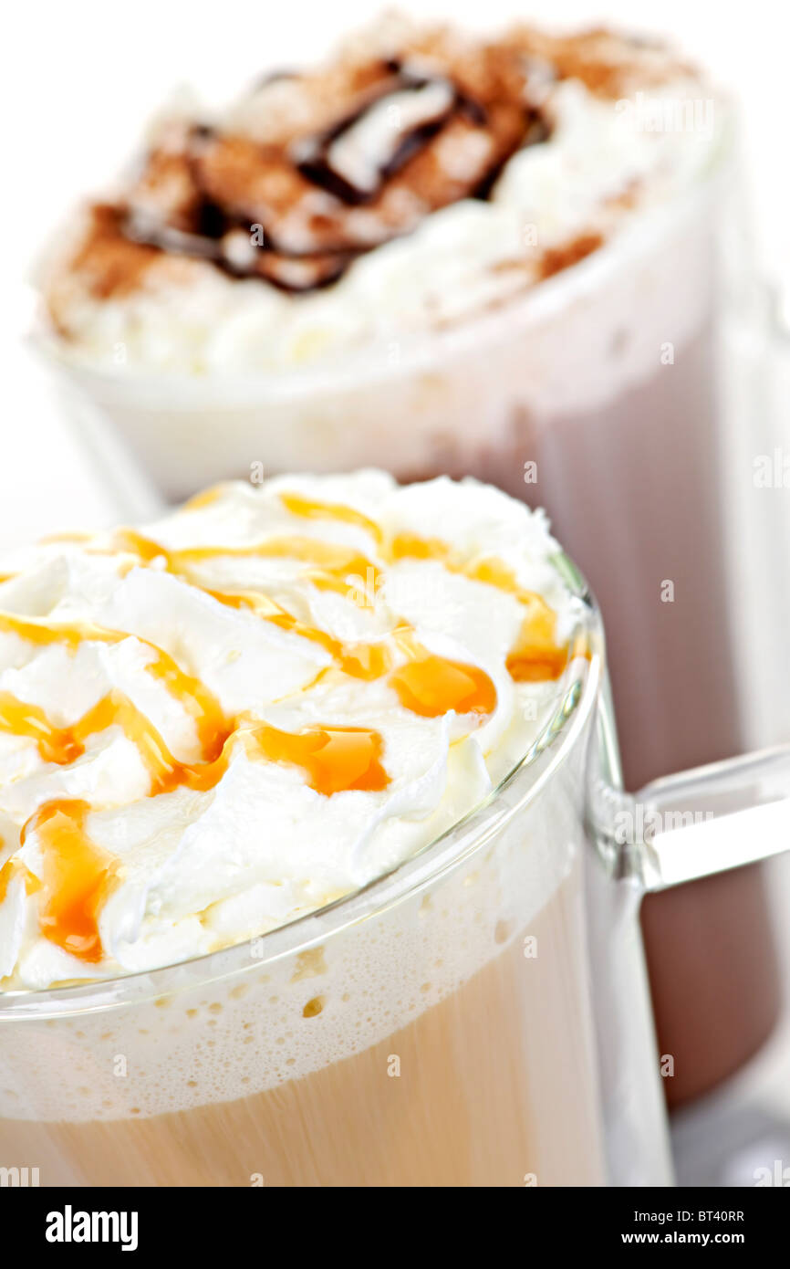 Hot chocolate and coffee latte beverages with whipped cream Stock Photo