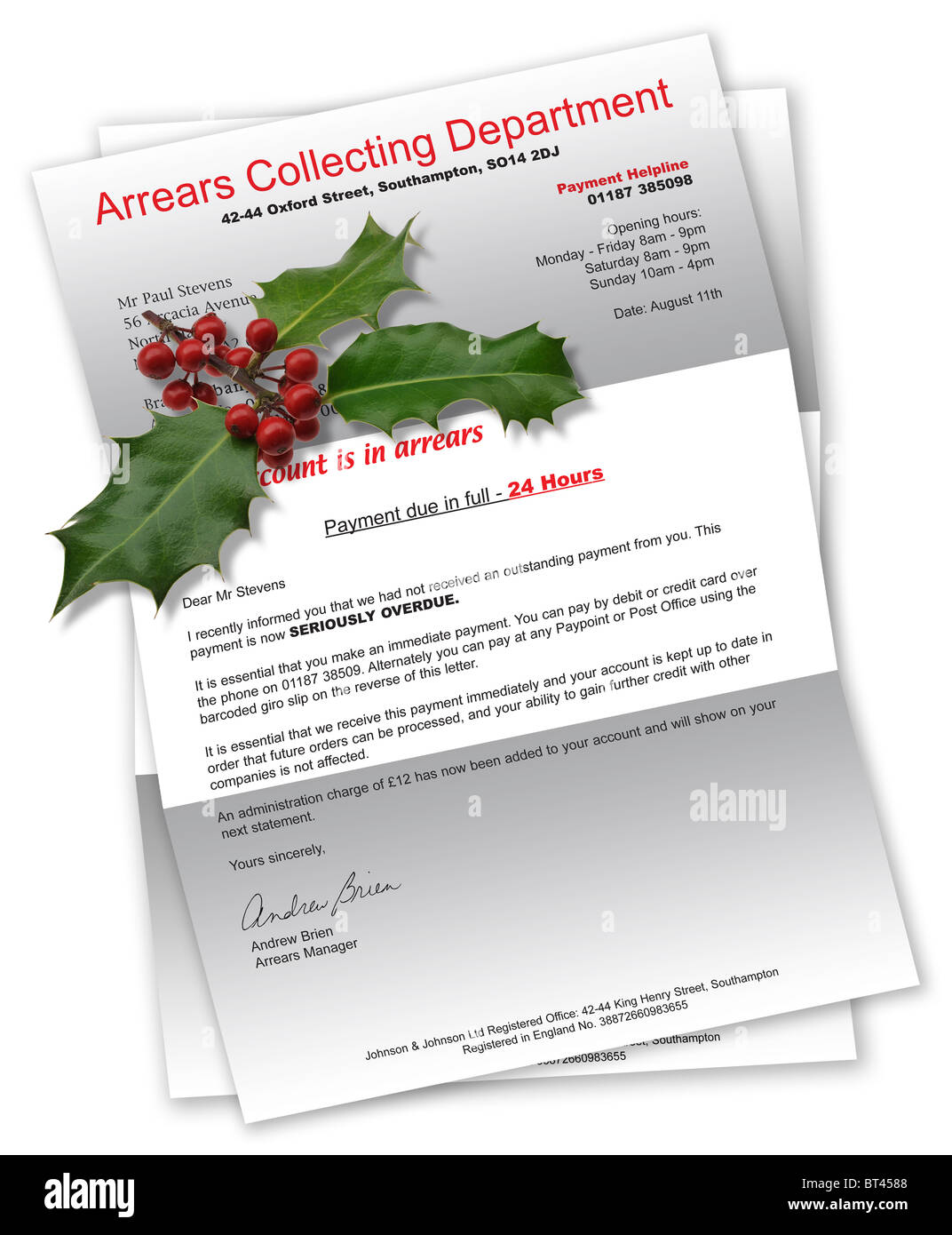 Collection Agency Letter due to unpaid/bad debt with Christmas holly Stock Photo