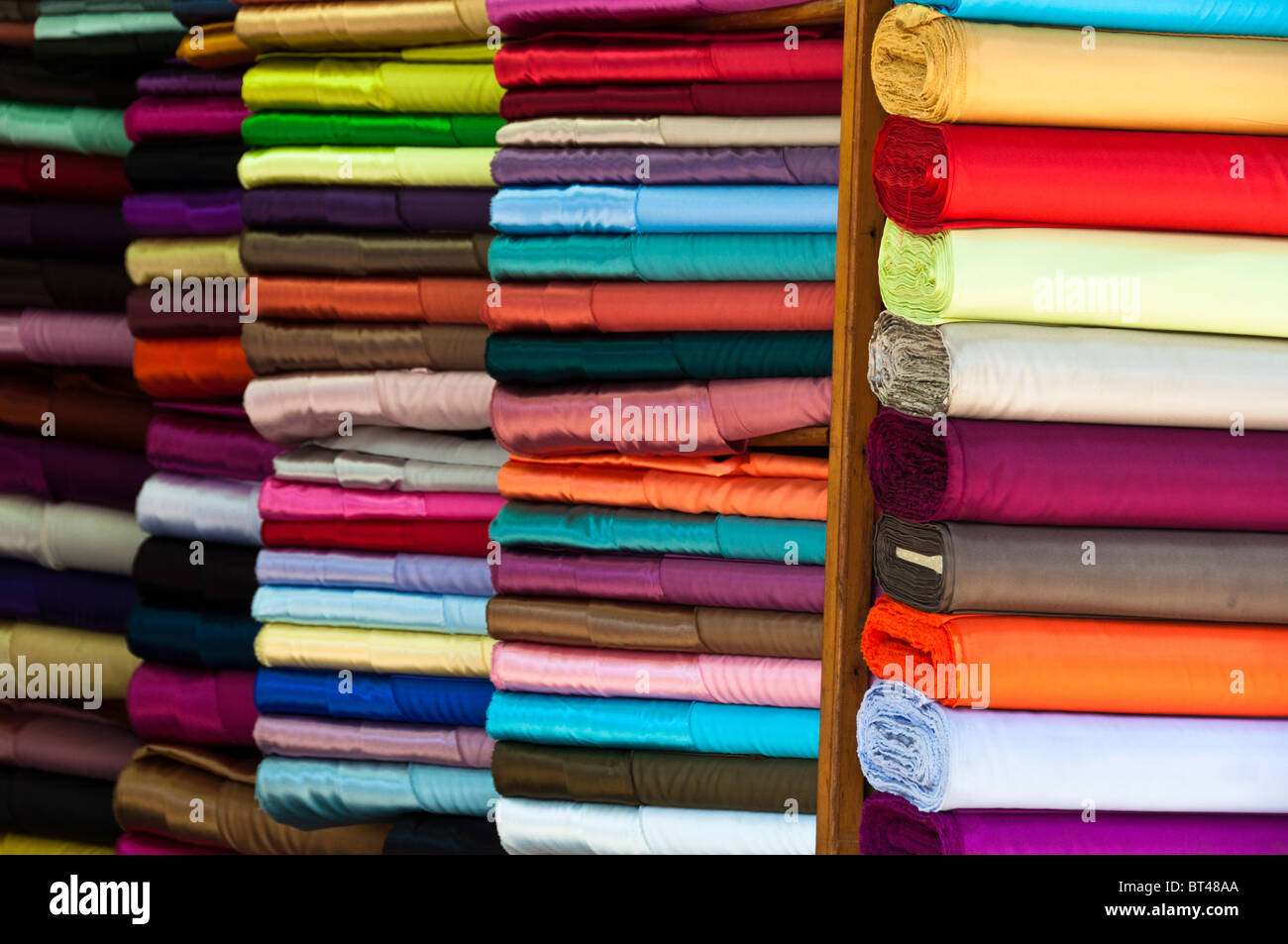 Large amount fabric bolts on hires stock photography and images Alamy