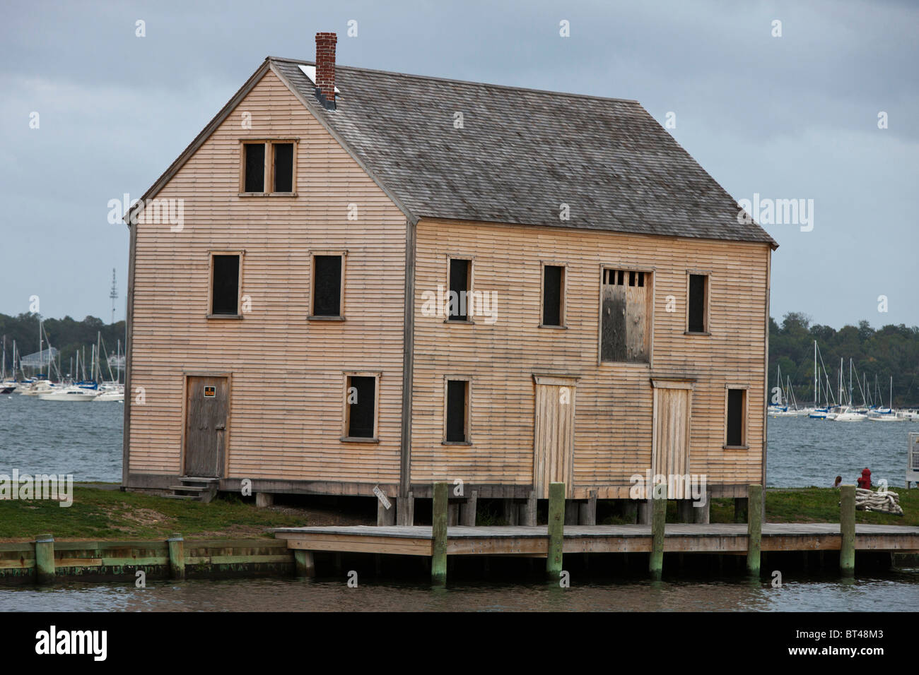 Abandoned and boarded up saltbox style building, Salem Maritime National Historic Site, Salem, Massachusetts Stock Photo