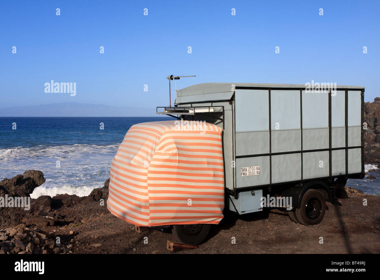 A vintage truck converted for use as a camper van on the west coast of Tenerife in the Canary Islands Spain Europe Stock Photo